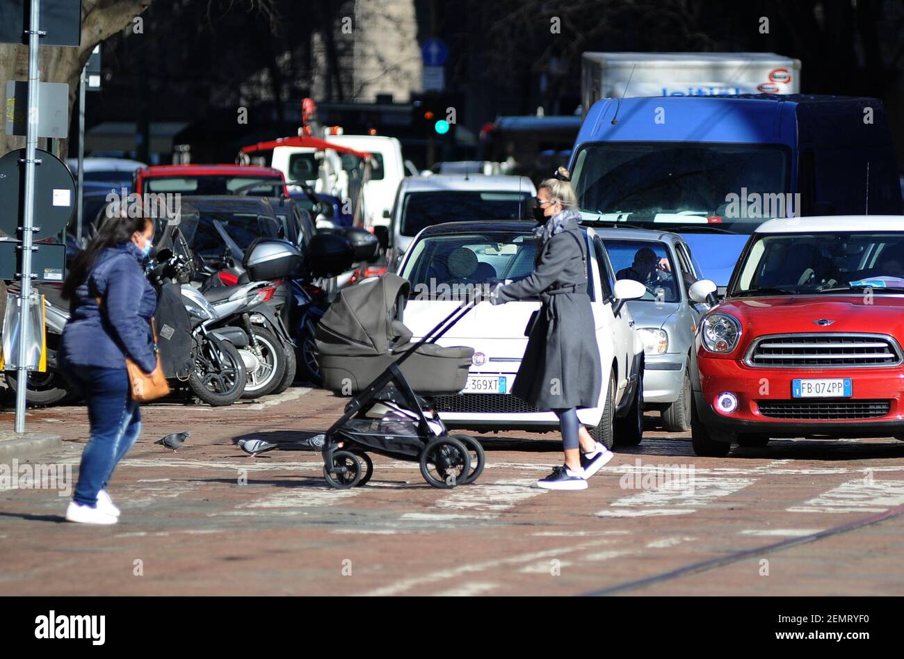 2/25/2021 - Milan, Agustina Gandolfo girlfriend of Lautaro Martinez in the center with the child Agustina Gandolfo, the Argentine girlfriend of LAUTARO MARTINEZ, INTER striker, surprised walking through the streets of the center with little NINA, born a few weeks ago. After having been to the hairdresser, Agustina Gandolfo also stops at a bar to breastfeed little NINA, before returning home. (Photo by IPA/Sipa USA) Credit: Sipa USA/Alamy Live News Stock Photo