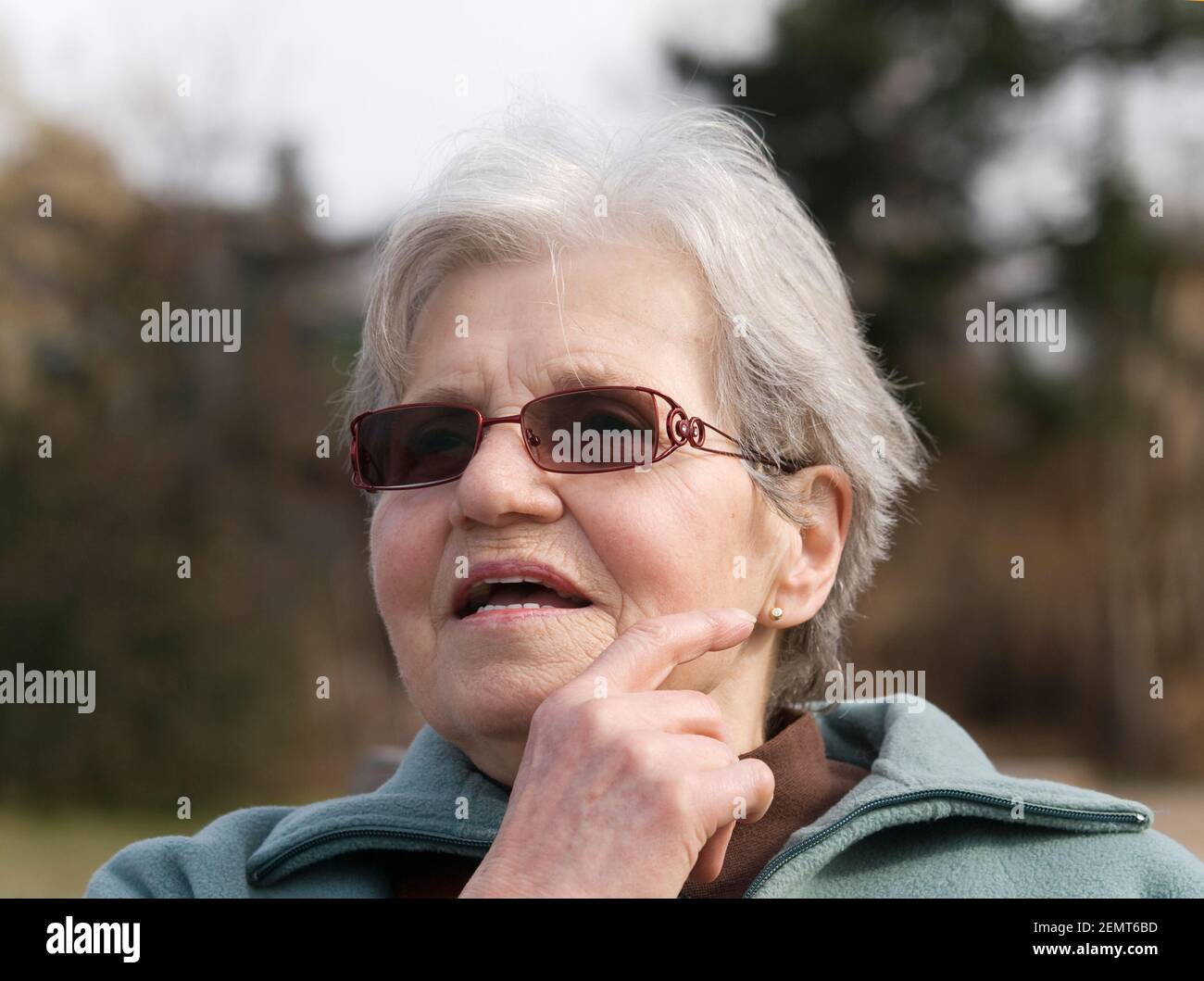 Happy old lady with sunglasses Stock Photo Alamy