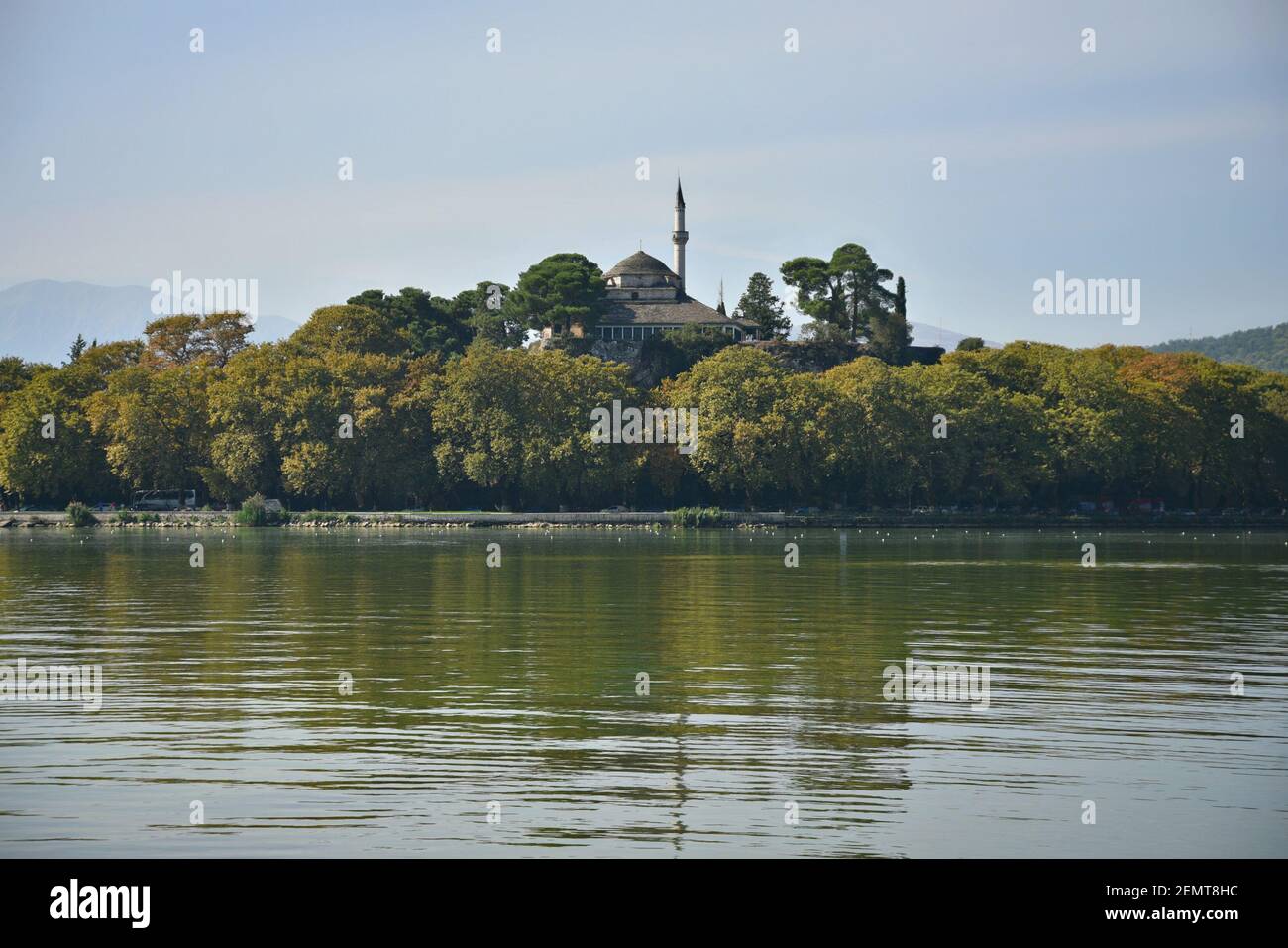 Landscape with panoramic view of the Ottoman Fethiye Mosque on Pamvotis Lake in Ioannina, Epirus, Greece. Stock Photo