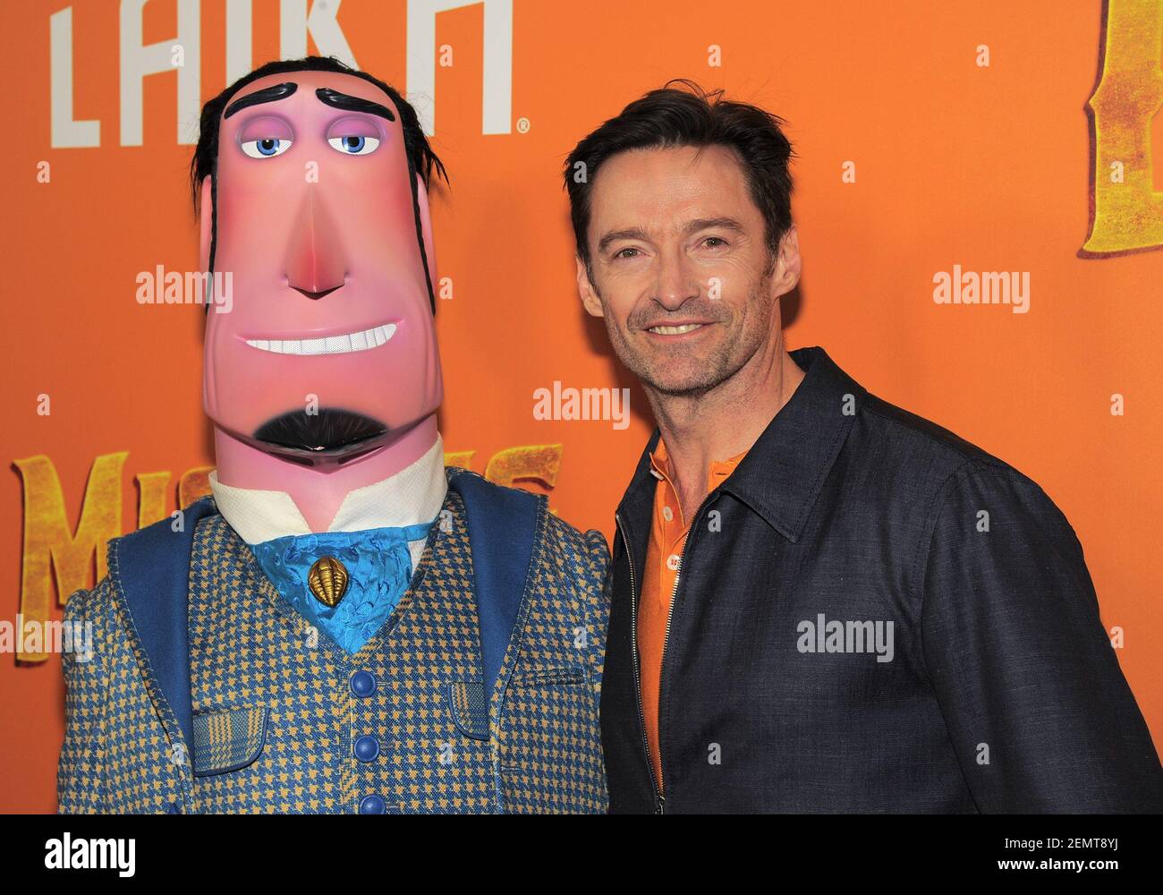 Hugh Jackman and a cartoon character form the movie attend Missing Link ...