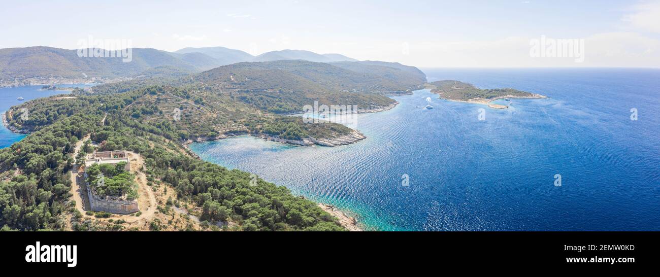 Aerial panoramic drone shot of Adriatic Coastline of Vis Island in Croatia summer Stock Photo