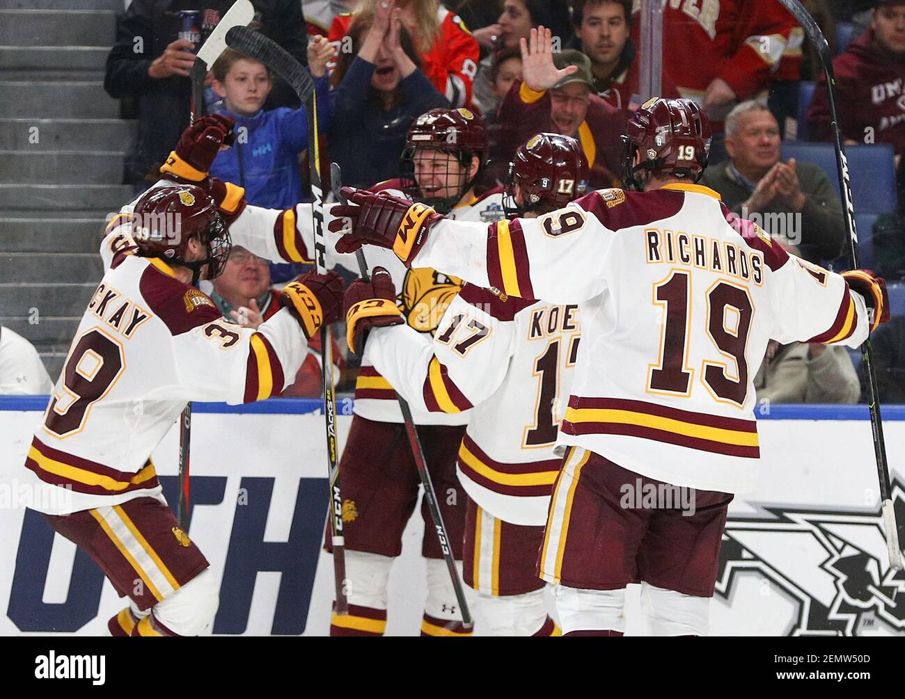 MinnesotaDuluth Bulldogs celebrate a goal by defenseman Mikey Anderson (24) during the second