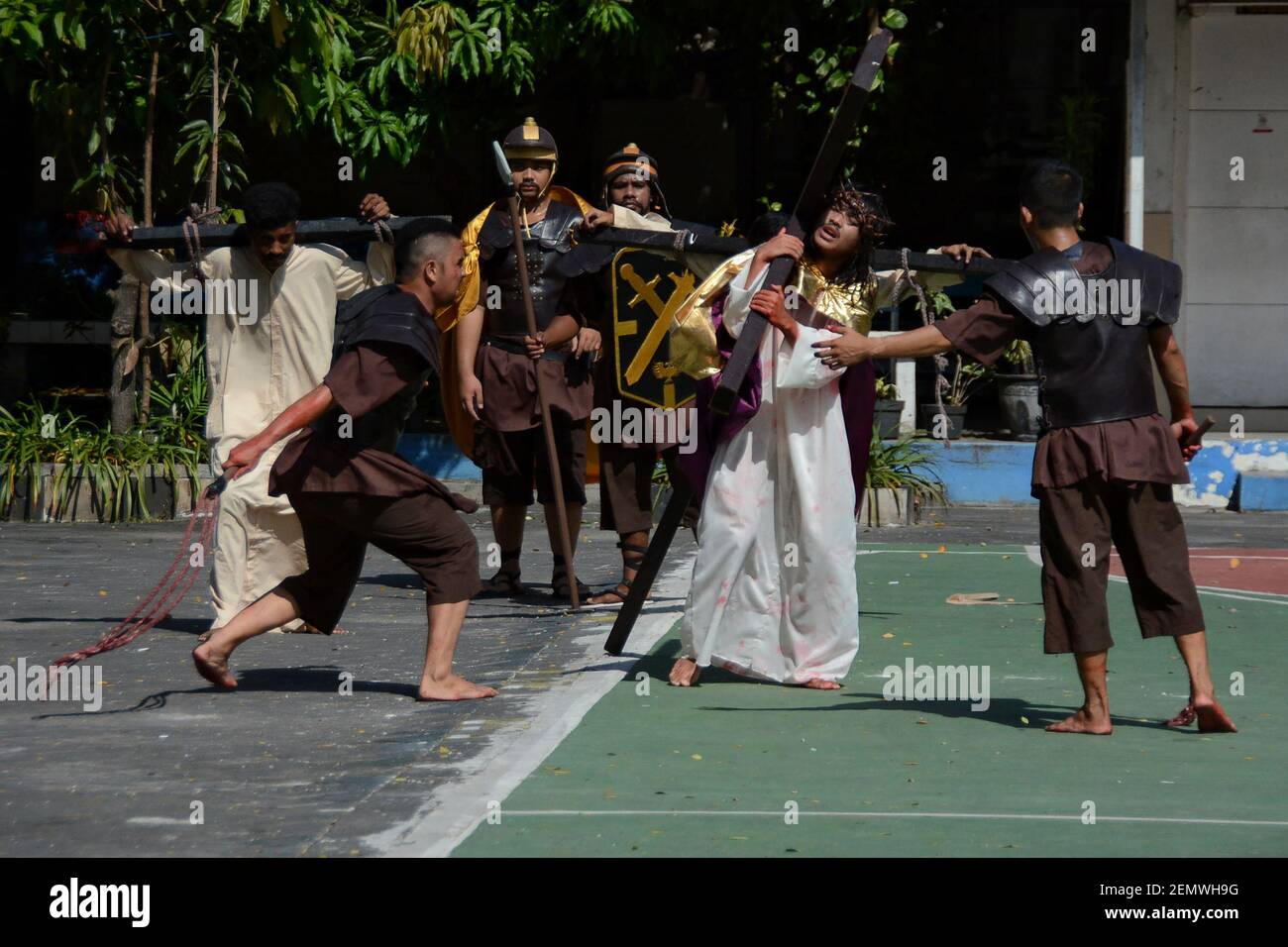 A number of actors performed theatrical visualization of the cross on ...