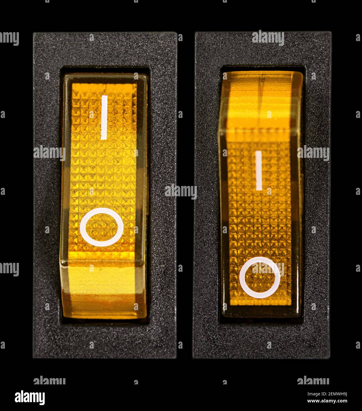 Yellow power switches at ON and OF position, isolated on black ...