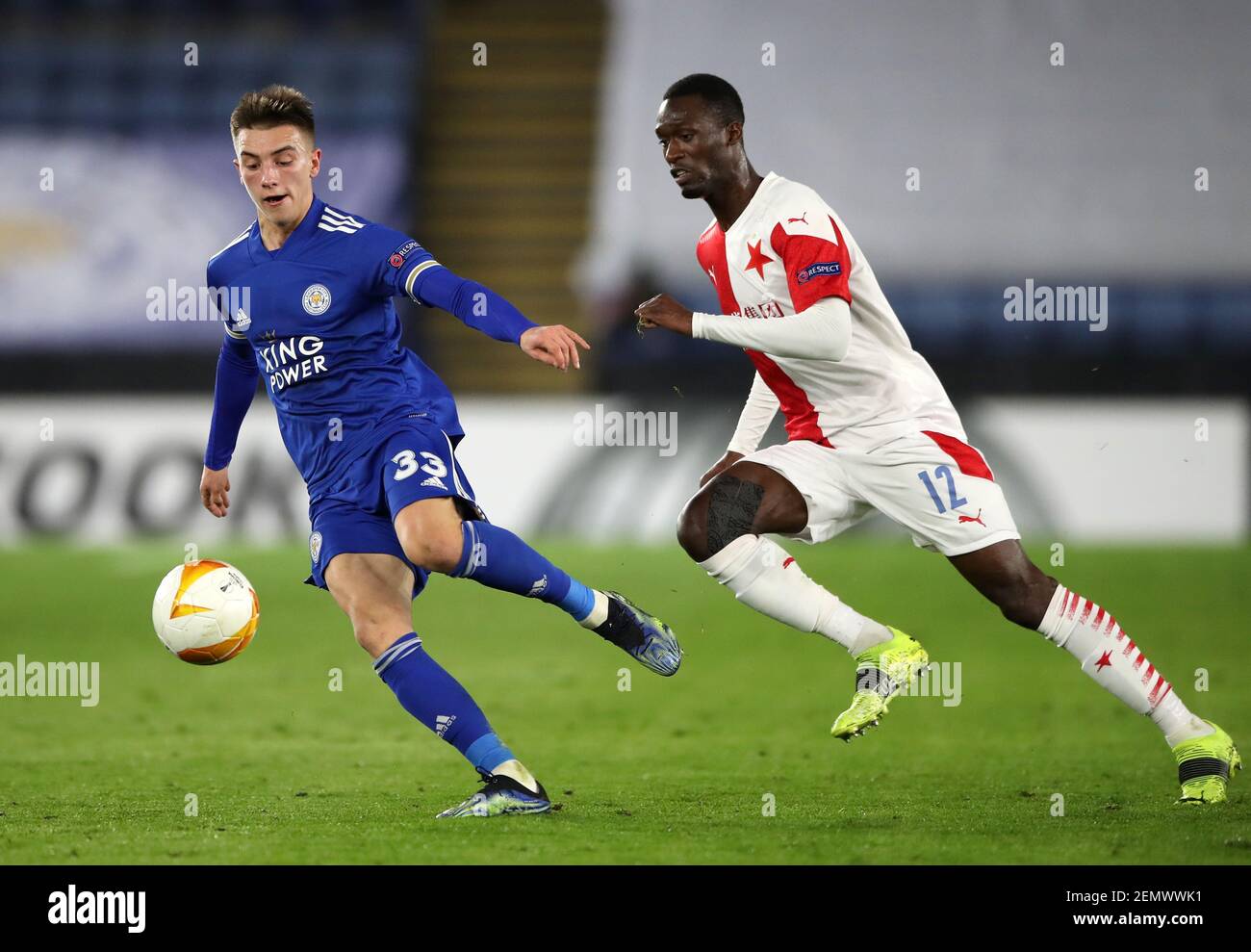 Leicester City's Luke Thomas (left) and and Slavia Praha's Abdallah Sima battle for the ball during the UEFA Europa League match at the King Power Stadium, Leicester. Picture date: Thursday February 25, 2021. Stock Photo