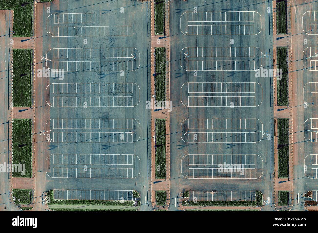 Empty car parking lots aerial top view from drone. Concrete urban