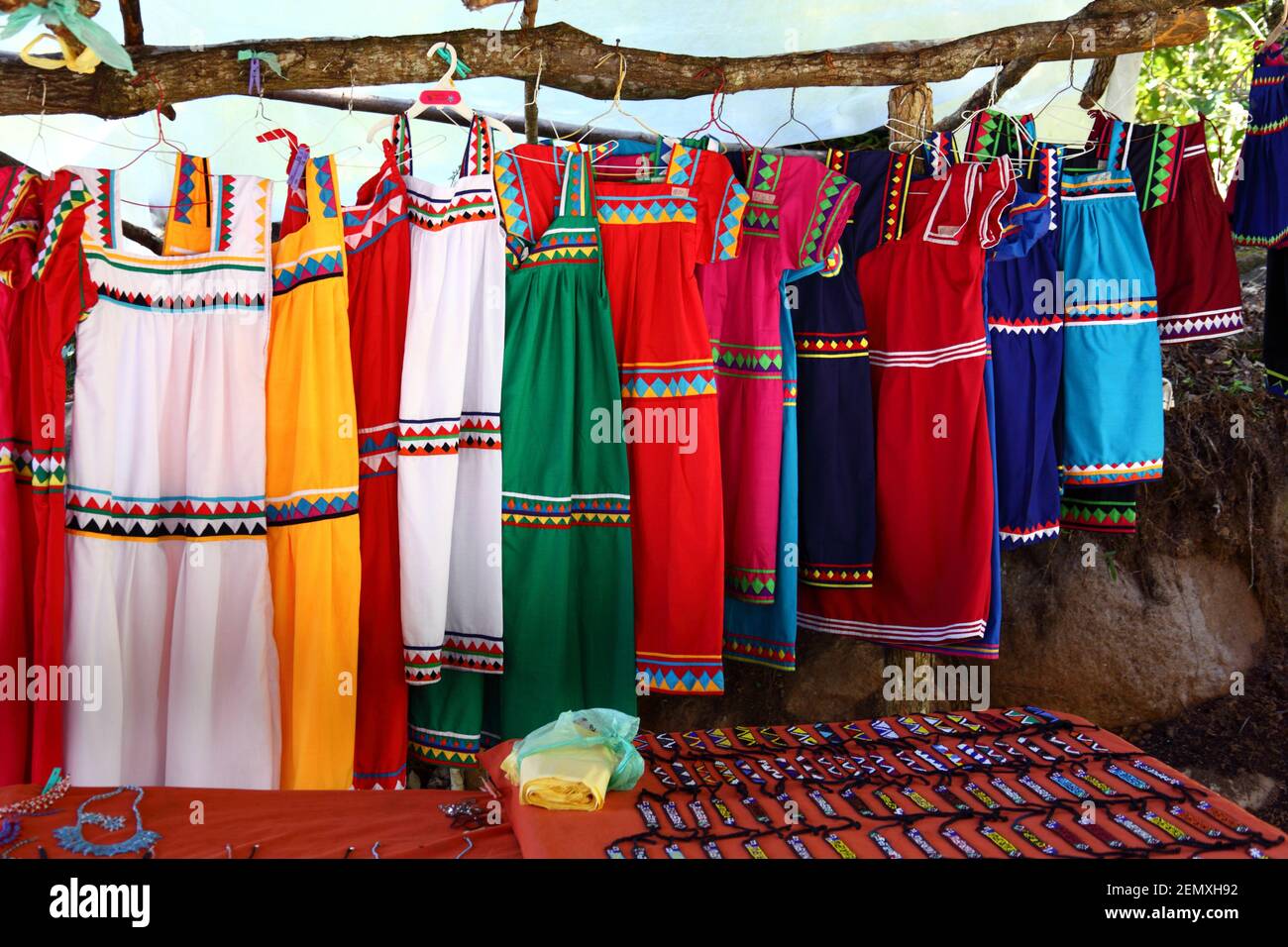 Traditional dresses worn by Ngobe Bugle women for sale in weekly market, Boquete, Chiriqui, Panama Stock Photo