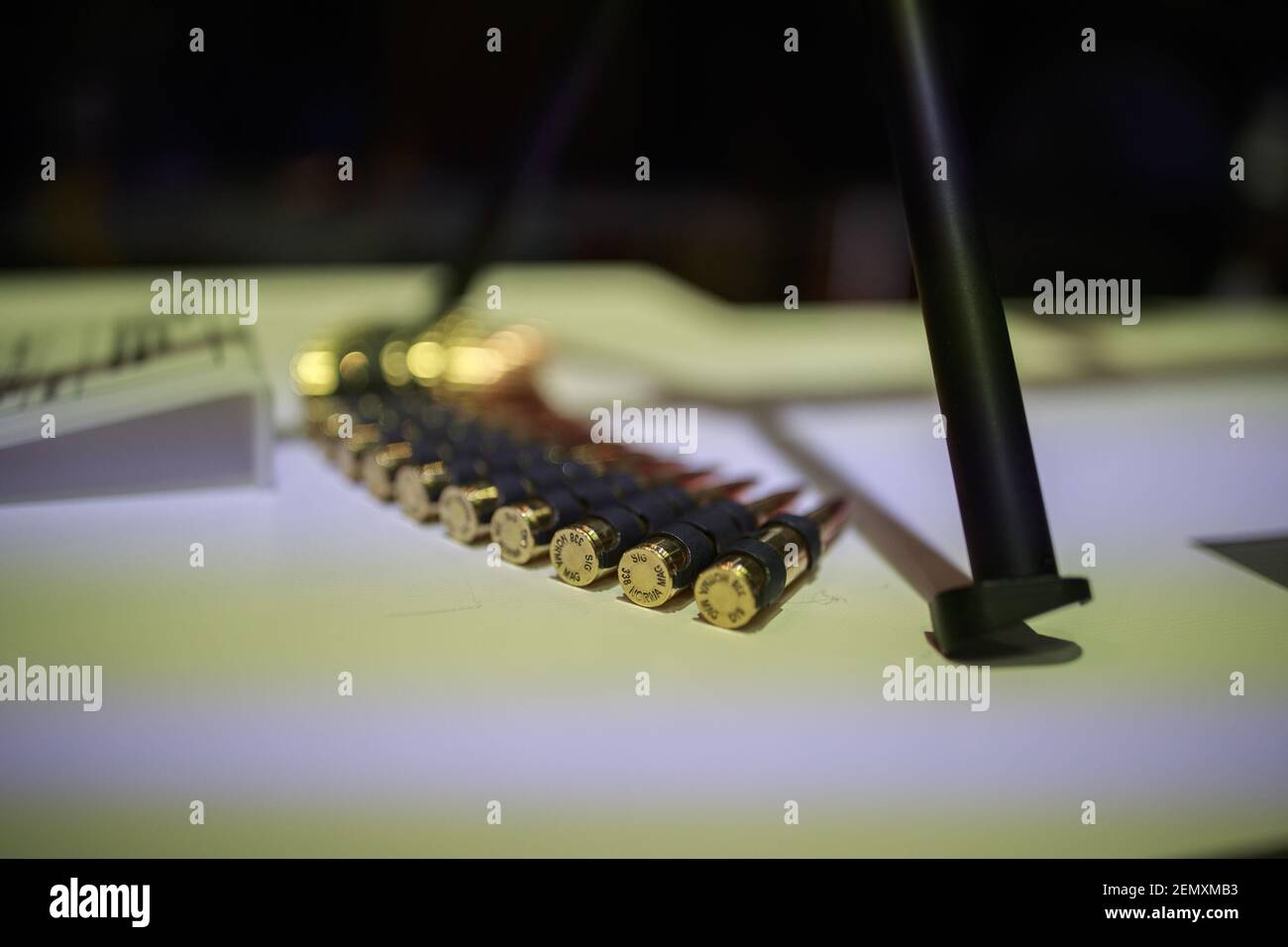A Sig Sauer open bolt machine gun chambered in 338 Norma is on display