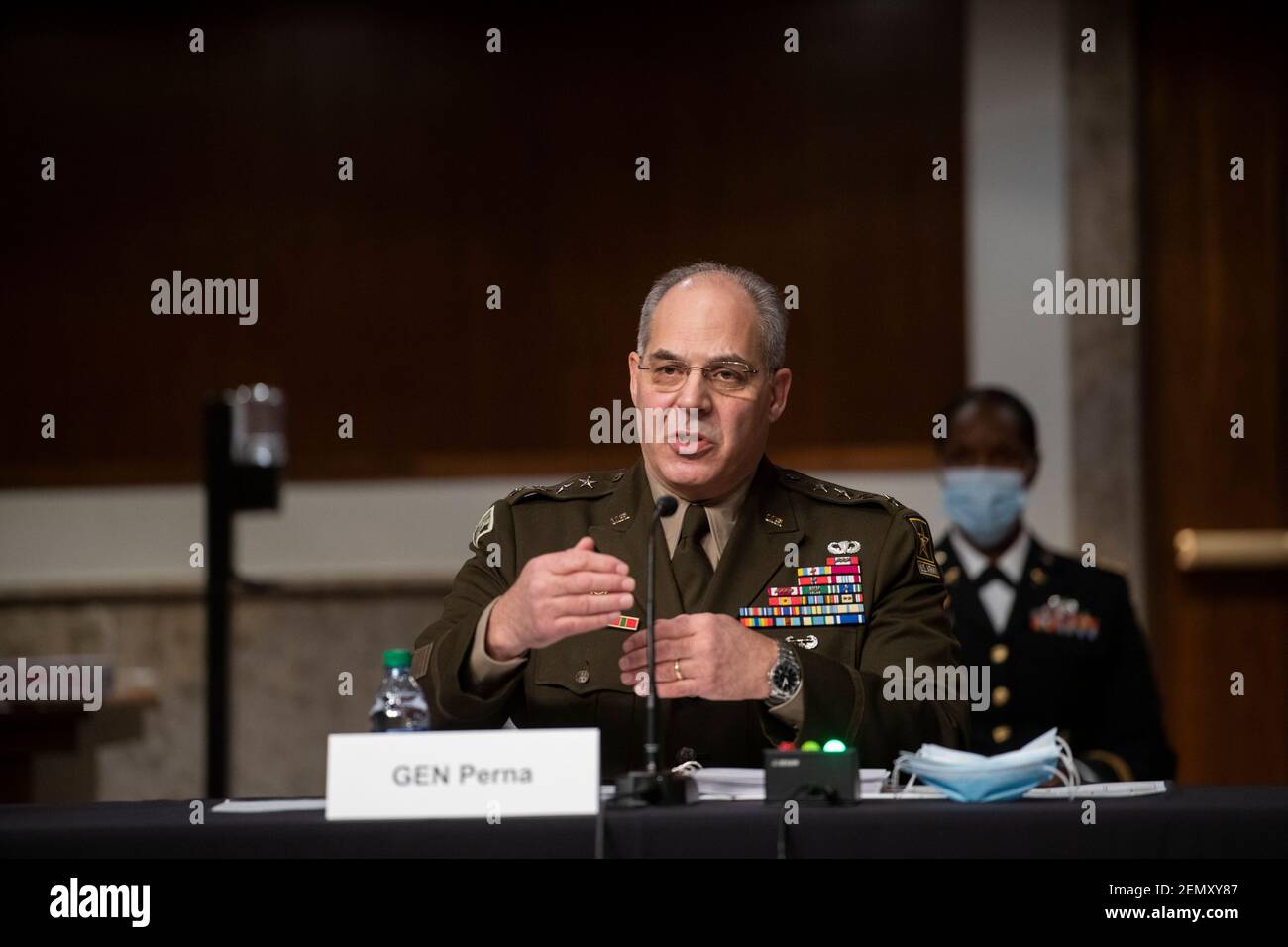 Washington, United States Of America. 25th Feb, 2021. General Gustave F. Perna, Chief Operating Officer, Federal COVID-19 Response For Vaccine And Therapeutics/appears before a Senate Committee on Armed Services hearing to examine Department of Defense support to the COVID-19 response, in the Dirksen Senate Office Building in Washington, DC, Thursday, February 25, 2021. Credit: Rod Lamkey/CNP | usage worldwide Credit: dpa/Alamy Live News Stock Photo