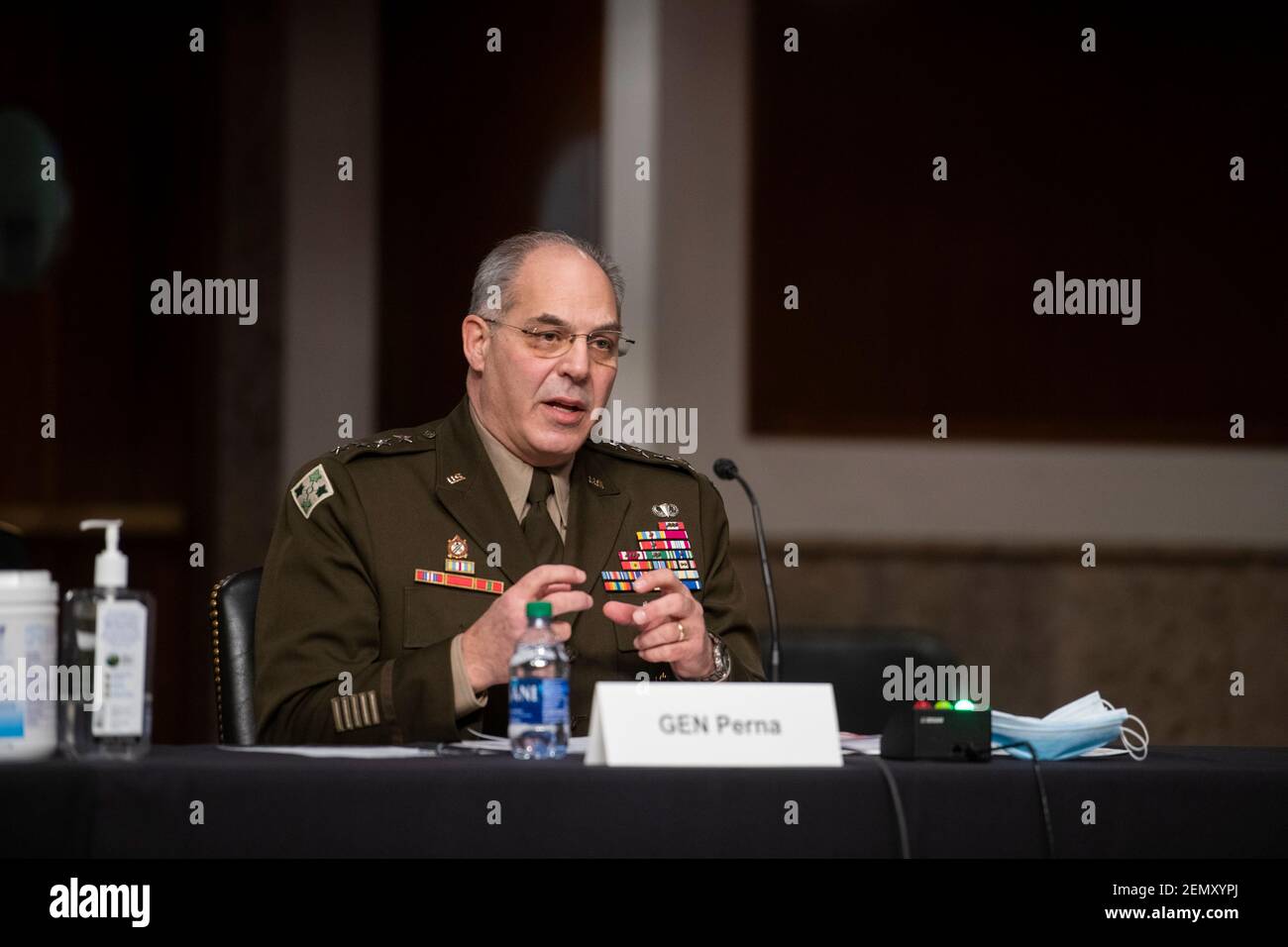 Washington, United States Of America. 25th Feb, 2021. General Gustave F. Perna, Chief Operating Officer, Federal COVID-19 Response For Vaccine And Therapeutics/appears before a Senate Committee on Armed Services hearing to examine Department of Defense support to the COVID-19 response, in the Dirksen Senate Office Building in Washington, DC, Thursday, February 25, 2021. Credit: Rod Lamkey/CNP | usage worldwide Credit: dpa/Alamy Live News Stock Photo