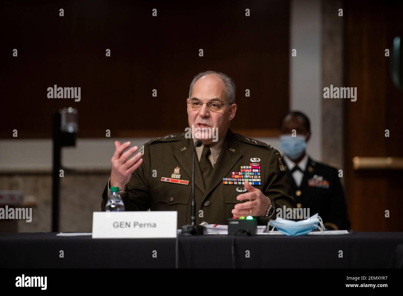 Washington, United States Of America. 25th Feb, 2021. General Gustave F. Perna, Chief Operating Officer, Federal COVID-19 Response For Vaccine And Therapeutics/appears before a Senate Committee on Armed Services hearing to examine Department of Defense support to the COVID-19 response, in the Dirksen Senate Office Building in Washington, DC, Thursday, February 25, 2021. Credit: Rod Lamkey/CNP | usage worldwide Credit: dpa/Alamy Live News Stock Photo
