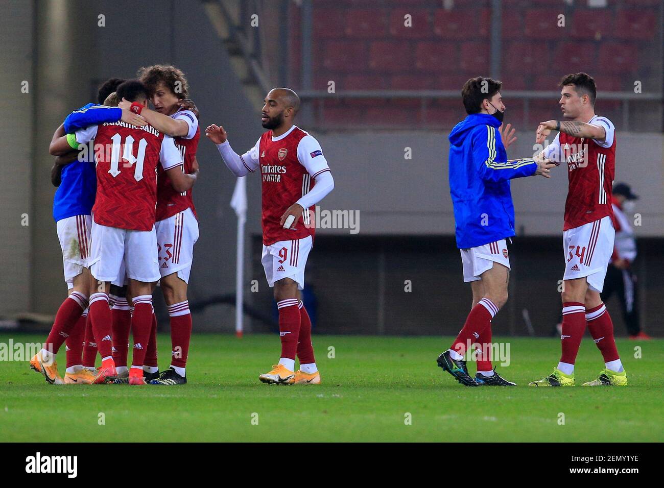 PIRAEUS, GREECE - FEBRUARY 25: Players of Arsenal FC celebrate after the UEFA Europa League Round of 32 match between Arsenal FC and SL Benfica at Karaiskakis Stadium on February 25, 2021 in Piraeus, Greece. (Photo by MB Media) Stock Photo