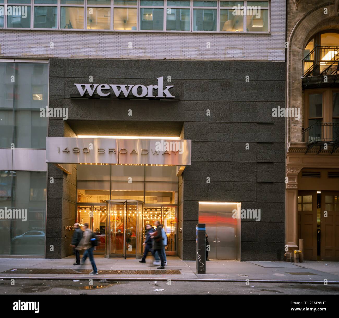 A sign announces the location of a a WeWork coworking space location