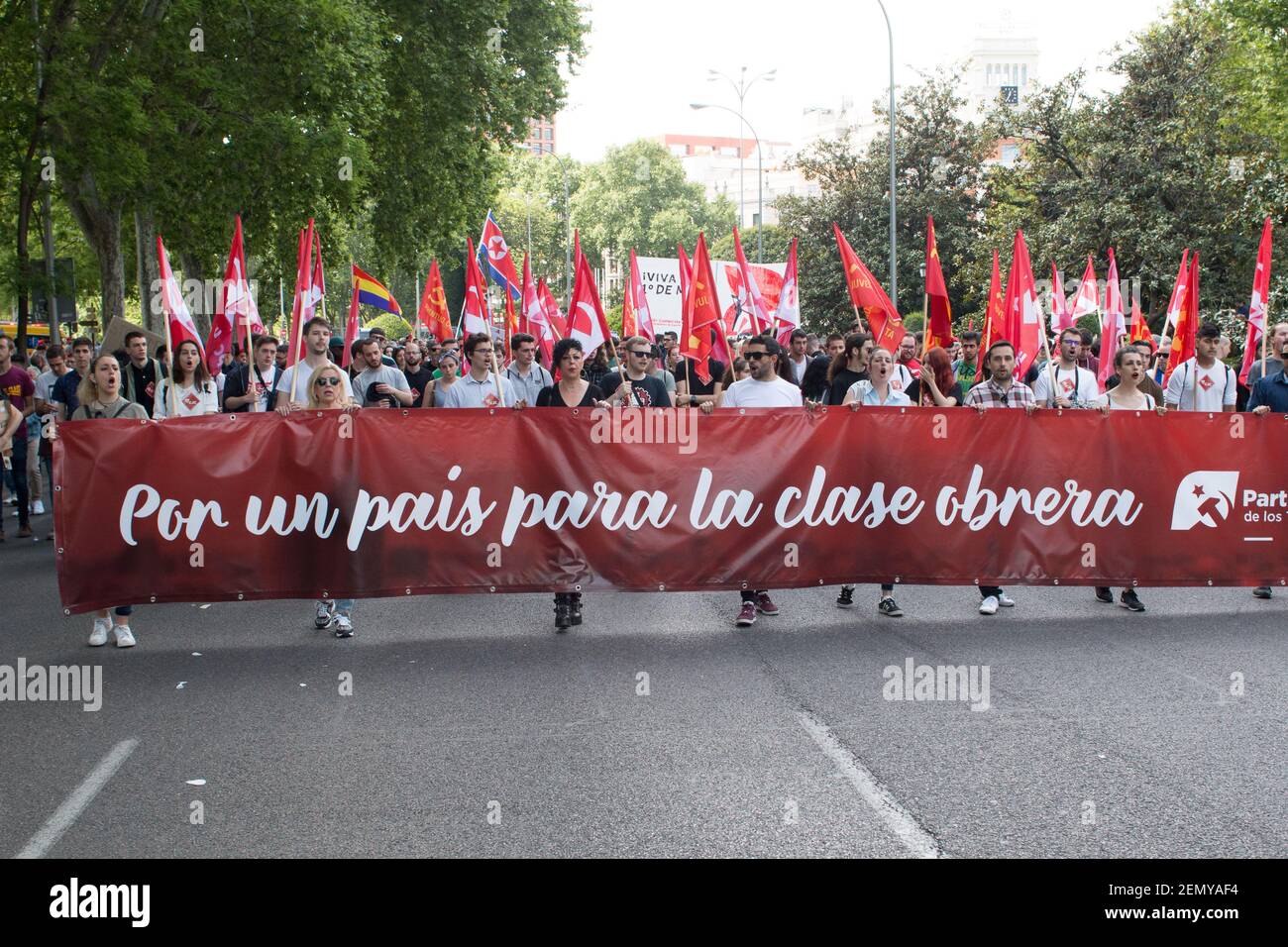 People take part in the Labor Day march held in downtown Madrid. Labor