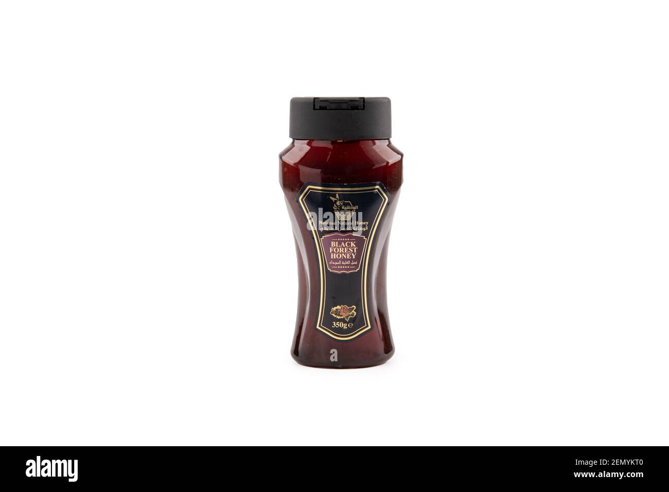 Black Forest Honey Bottle on isolated background Stock Photo