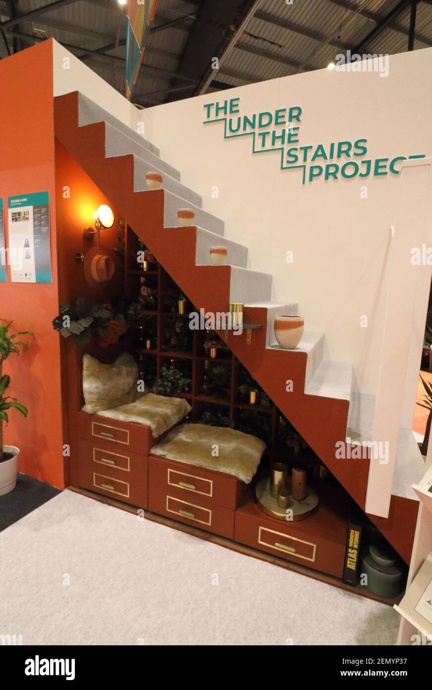 The Under the Stairs Project seen during the exhibition. Grand Designs Live  exhibition sponsored by Anglian Home Improvements, with more than 500  exhibitors in zones for sustainable technology, self-build, design, grand  technology,
