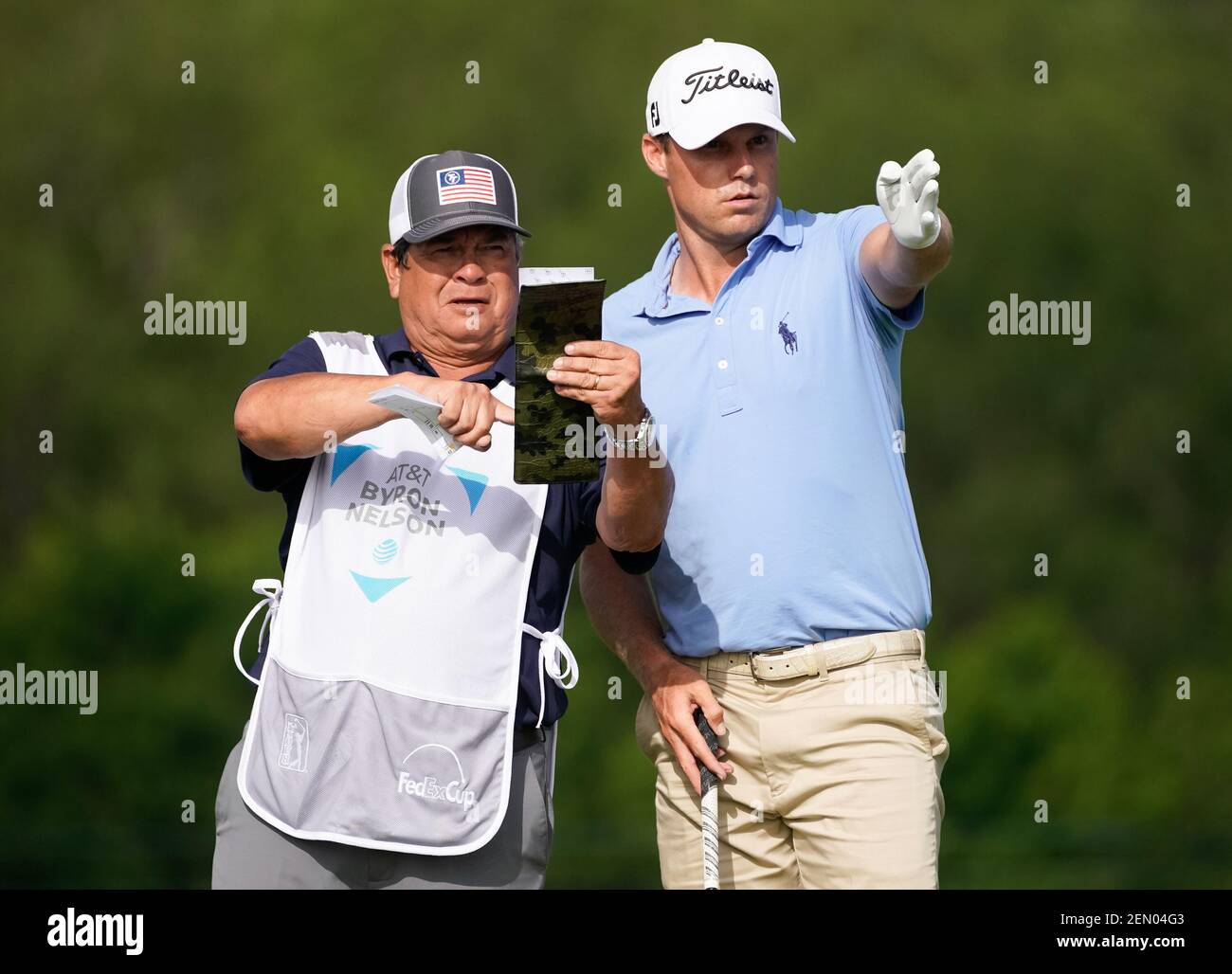 May 9, 2019; Dallas, TX, USA; Nick Watney (right) talks with caddie