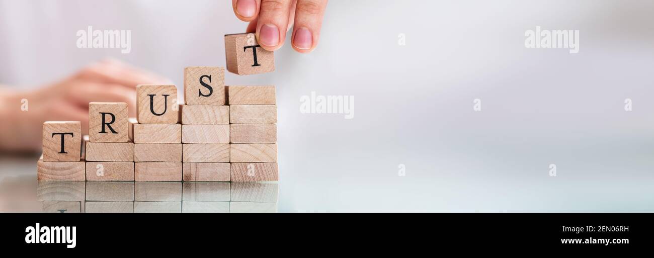 Trust And Loyalty Management Letter Stack In Office Stock Photo