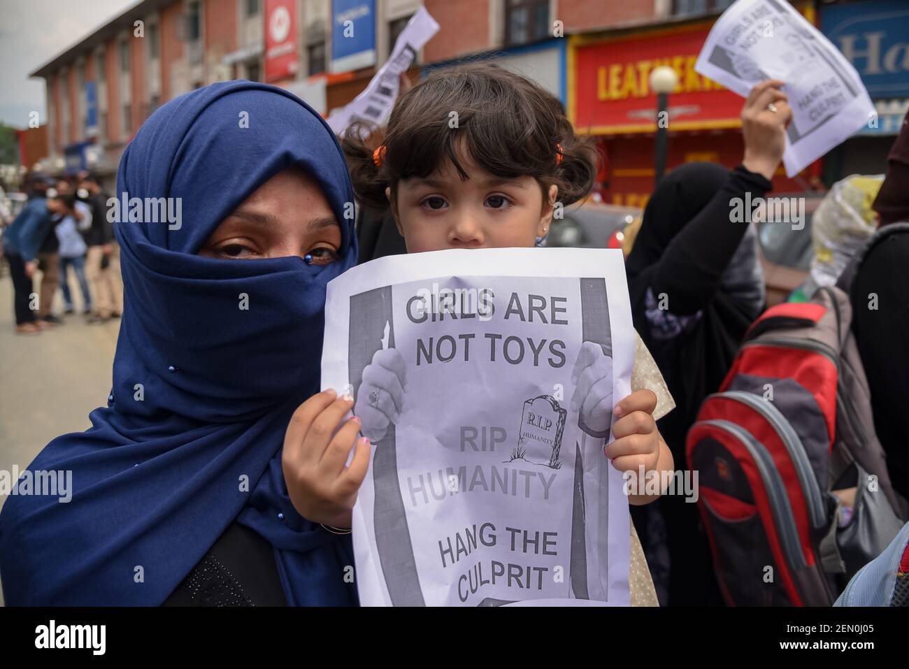 A young Kashmiri Protester seen holding a placard during a protest in ...