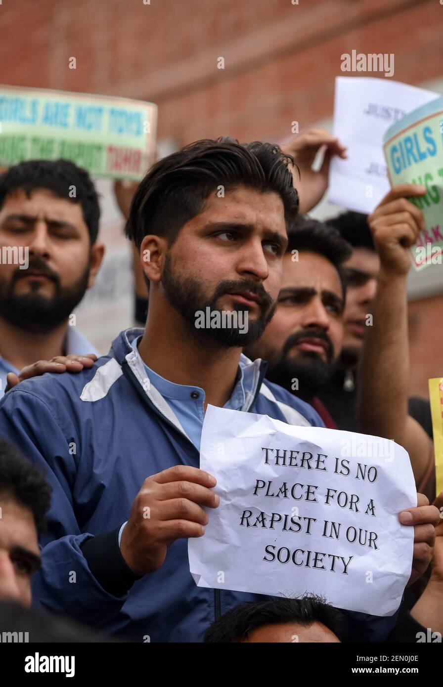 A Kashmiri Protester seen holding a placard during a protest in ...