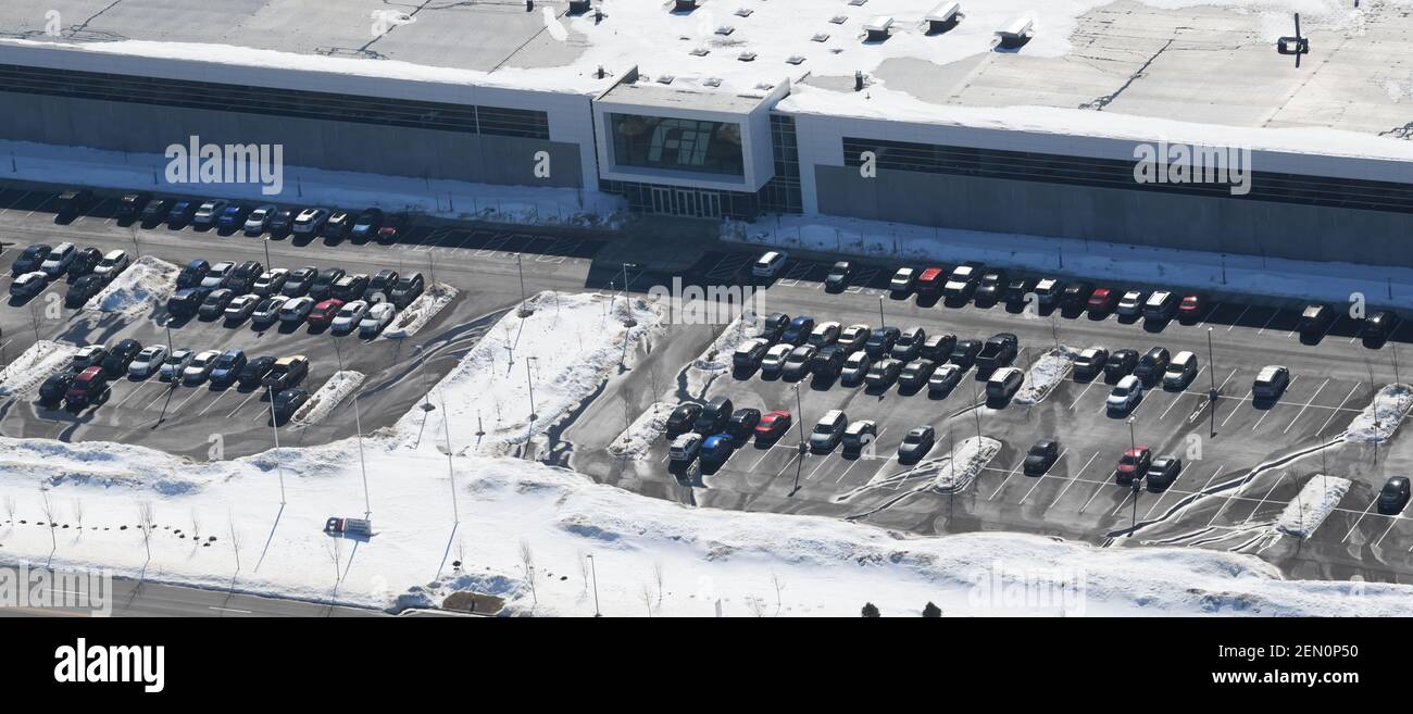 Mount Pleasant, Wisconsin, USA. 25th Feb, 2021. The Foxconn campus in the Village of Mount Pleasant, Wisconsin is shown Thursday February 25, 2021. As questions continue about the level of employment at Foxconn, few cars are parked late morning at the Smart Manufacturing Center building. (Credit Image: © Mark HertzbergZUMA Wire) Stock Photo