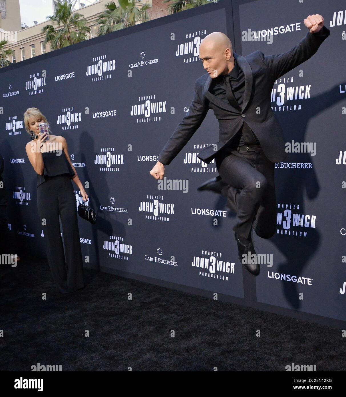 (RL) Mark Dacascos and Wife Julie Condra at Lionsgate's "John Wick