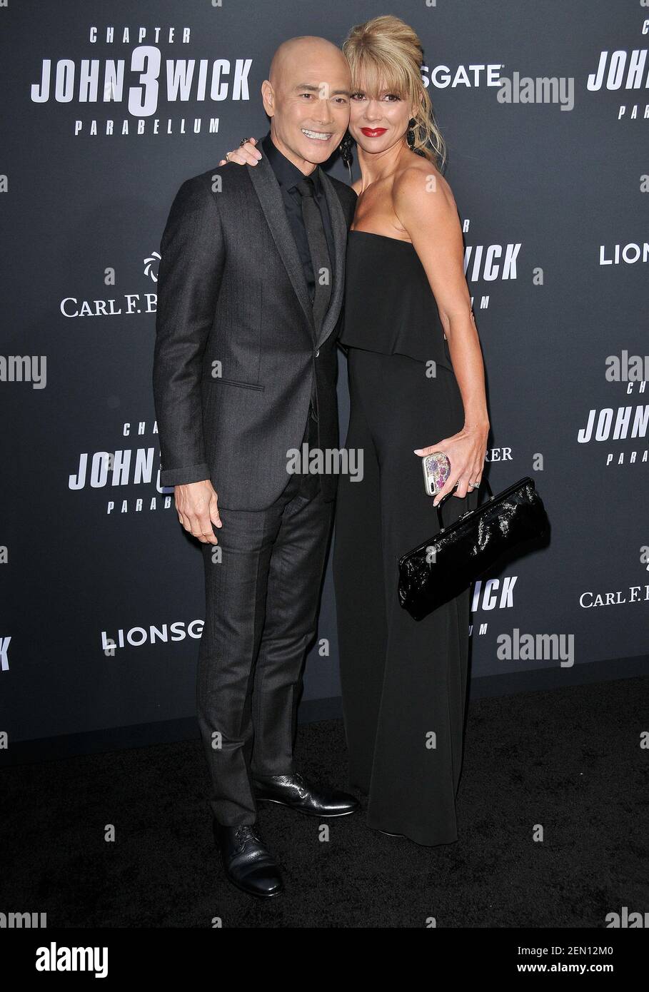(LR) Mark Dacascos and Wife Julie Condra at Lionsgate's "John Wick