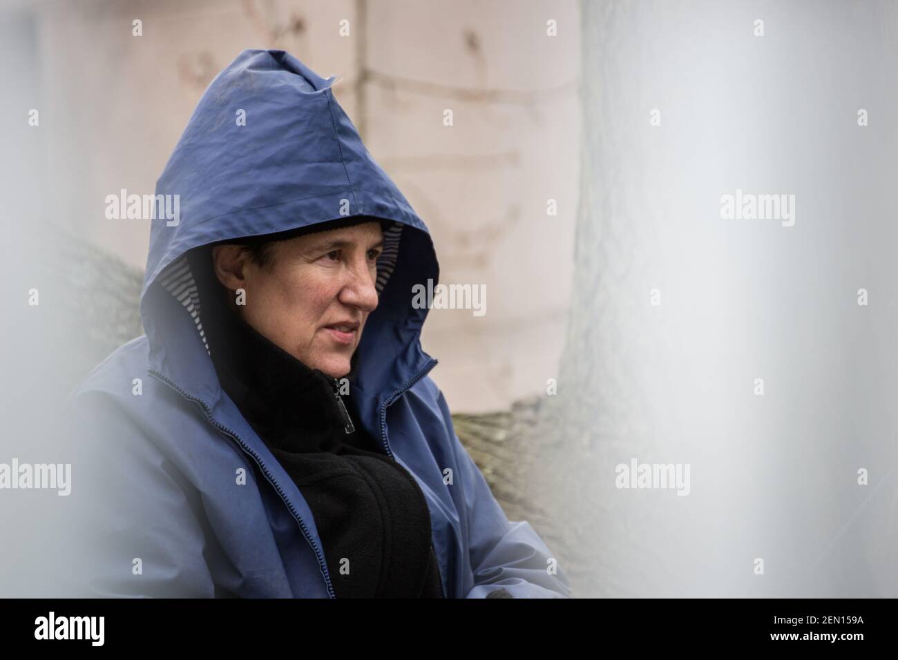 Wandsworth, London, UK; 22nd February, 2021: A portrait of the Tree Protector Maria Gallastegui, 62, after her first night on the tree. Maria is one of the three activists that have climbed a 100-year-old black poplar tree in York Gardens, Battersea, in a bid to save it from felling. The tree was due for cutting down to make way for a new electric cable, part of the local housing regeneration scheme. The tree protectors and their supporters believe the cable could have been diverted to spare the tree. The poplar tree, a Category A, high amenity value tree, can only be felled if there are compe Stock Photo
