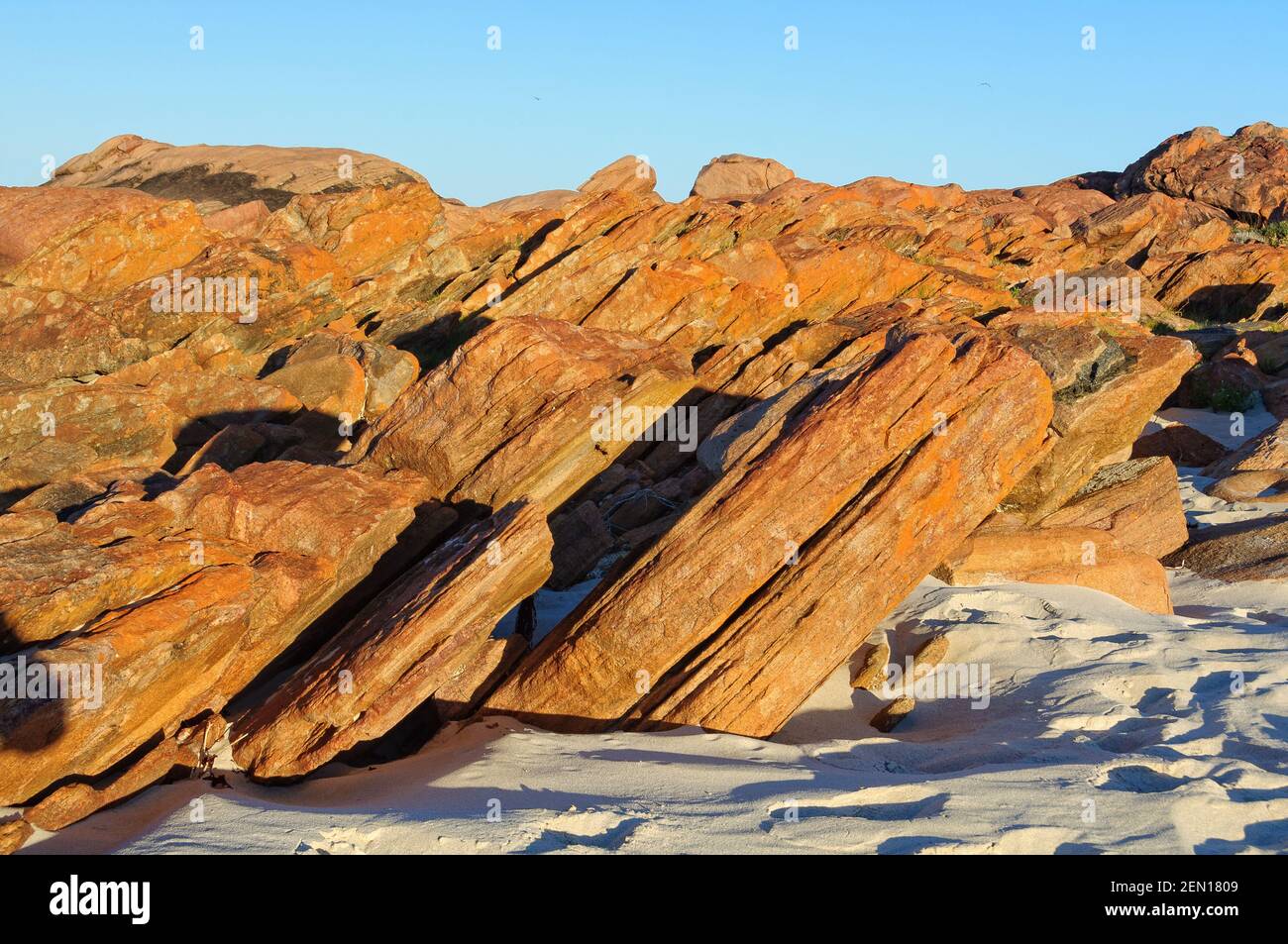Beautiful orange rocks and sand on Meelup Beach - Dunsborough, WA, Australia Stock Photo