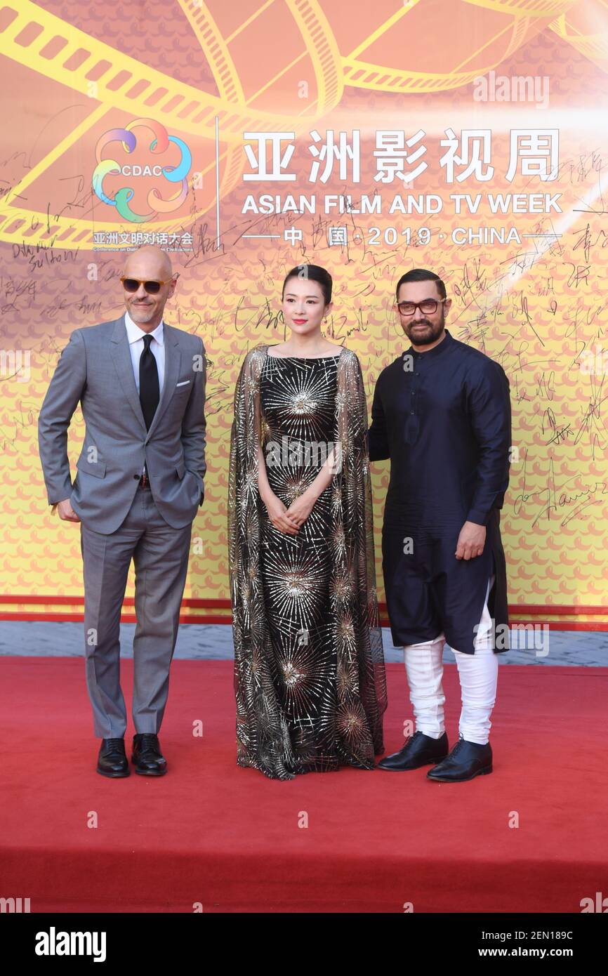 Chinese actress Zhang Ziyi, center, and Indian actor Aamir Khan, right, pose as they arrive on the red carpet for the launch ceremony of Asian Film and TV Week during the Conference on Dialogue of Asian Civilizations (CDAC) in Beijing, China, 16 May 2019. (Photo by Cao ji - Imaginechina/Sipa USA) Stock Photo