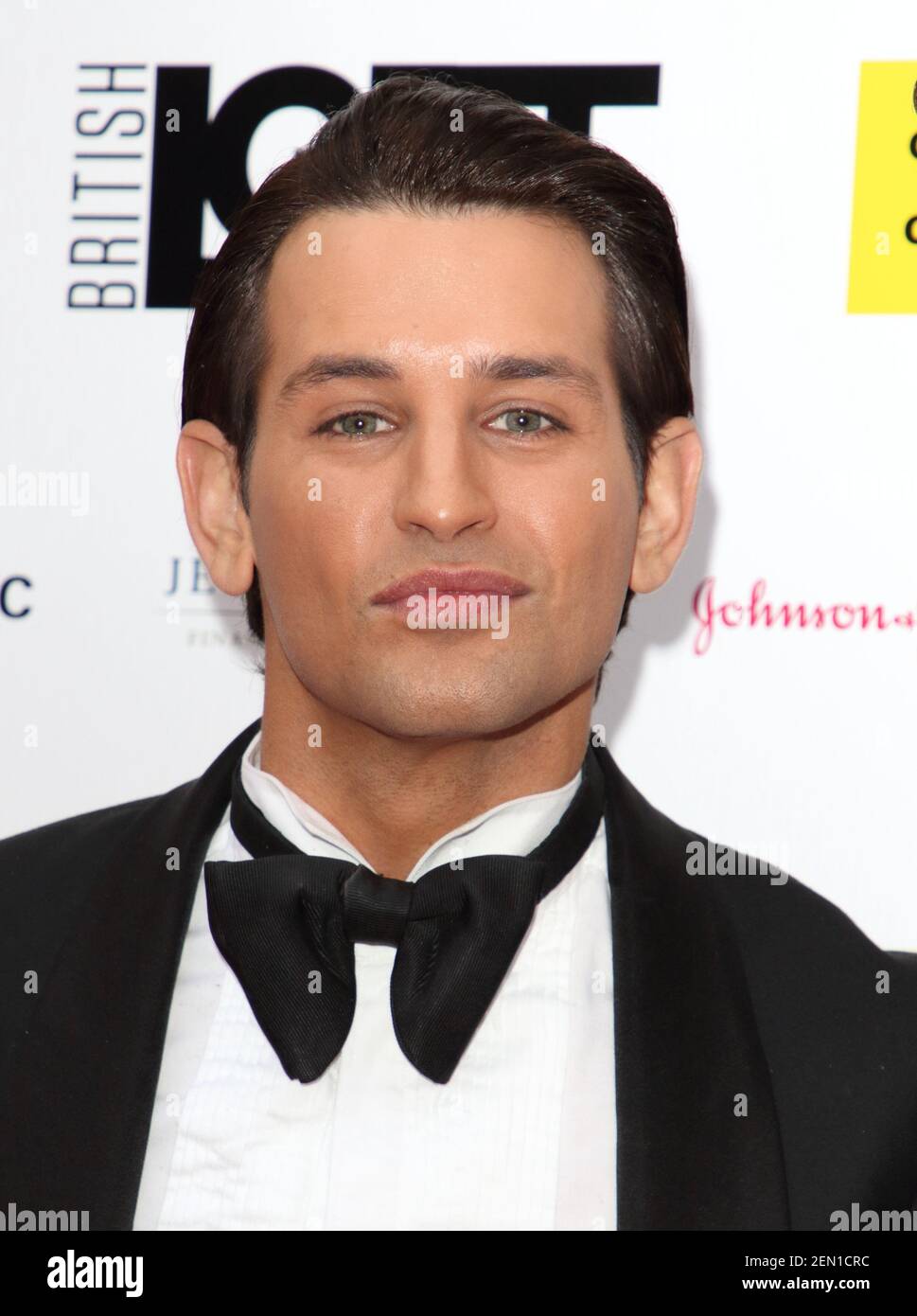 Ollie Locke arrives on the red carpet at the British LGBT Awards at the