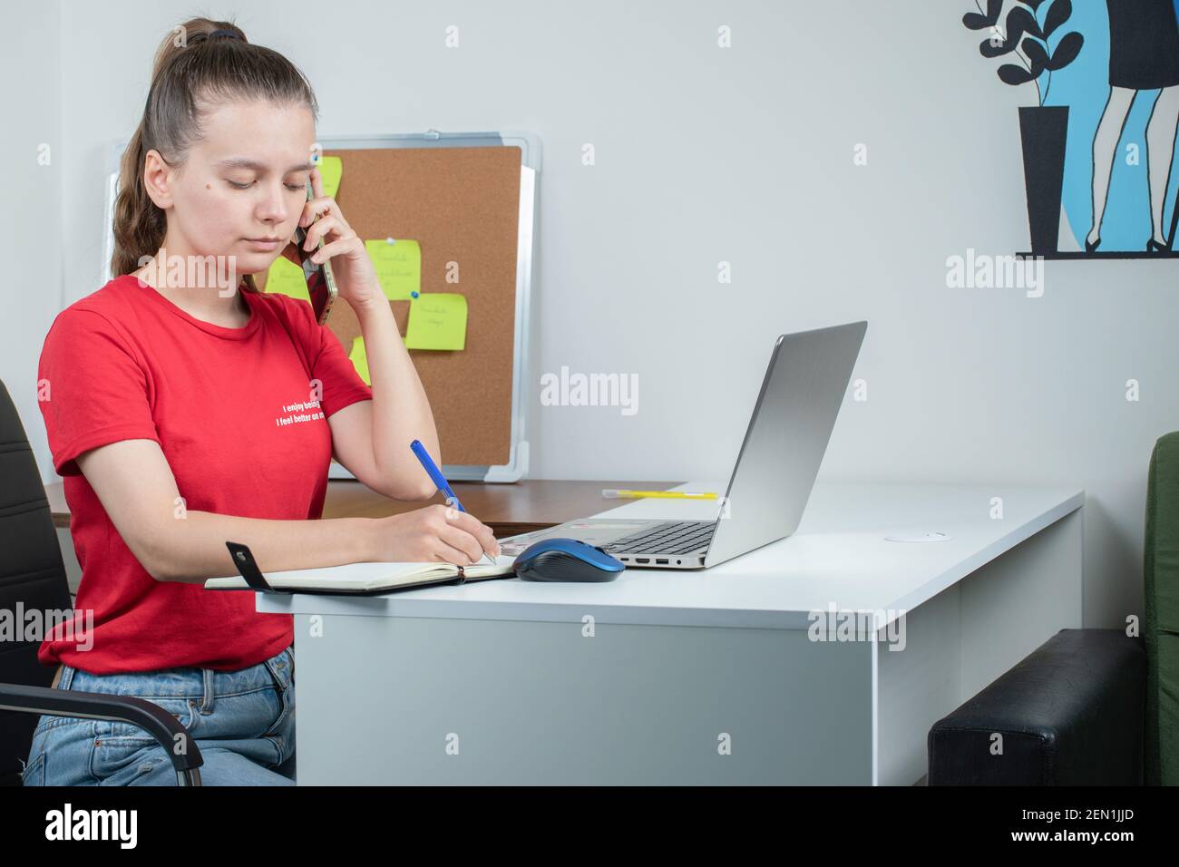 Call center operator having phone calls with customers Stock Photo