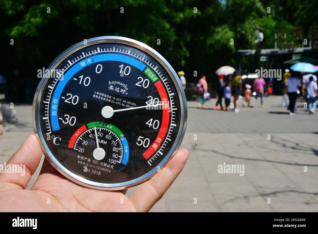 A thermometer with reading of the temperature at 38 degrees Celsius is  displayed under the sun on a scorching day in Beijing, China, 23 May 3019.  A heat wave that hit northern
