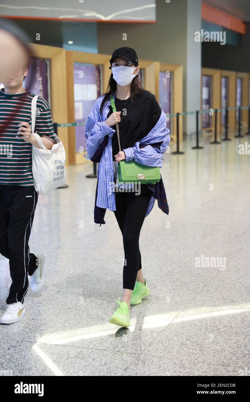 Chinese actress Guan Xiaotong arrives at the Shanghai Hongqiao