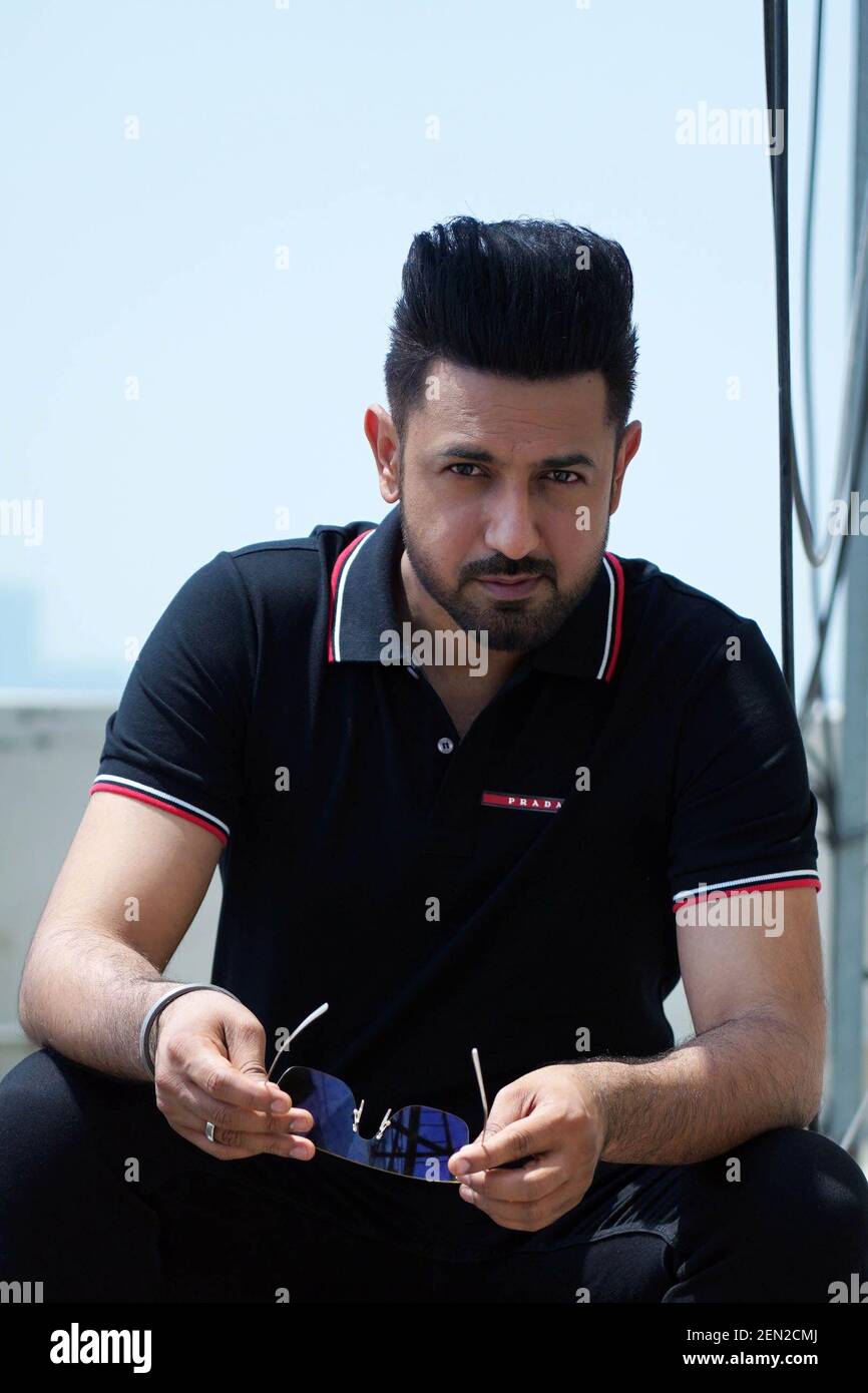 Punjabi actor and singersongwriter Gippy Grewal poses during an   Singer Songwriting Actors