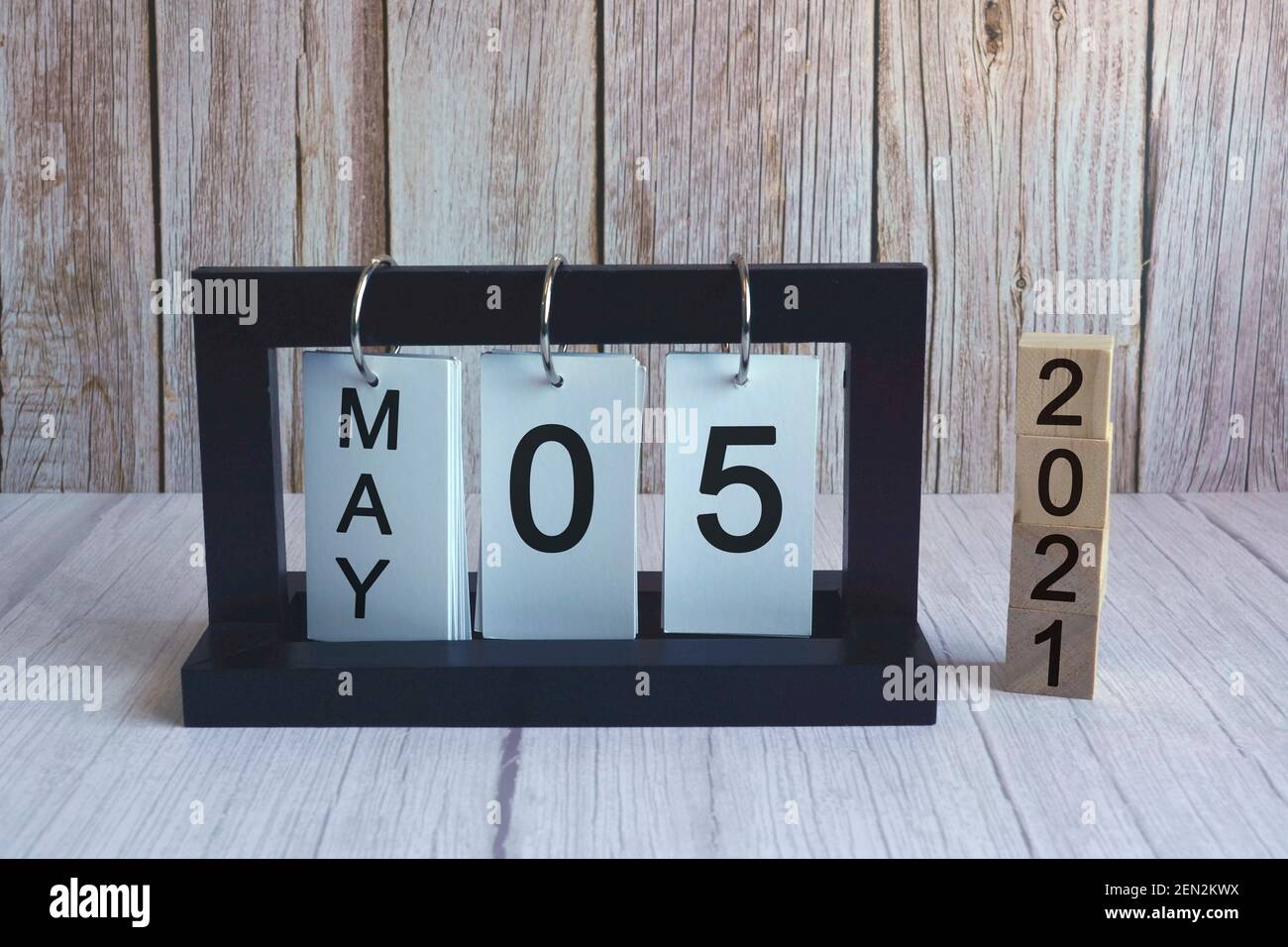 Text on wooden block cube and paper stand frame. Labor day concept Stock Photo