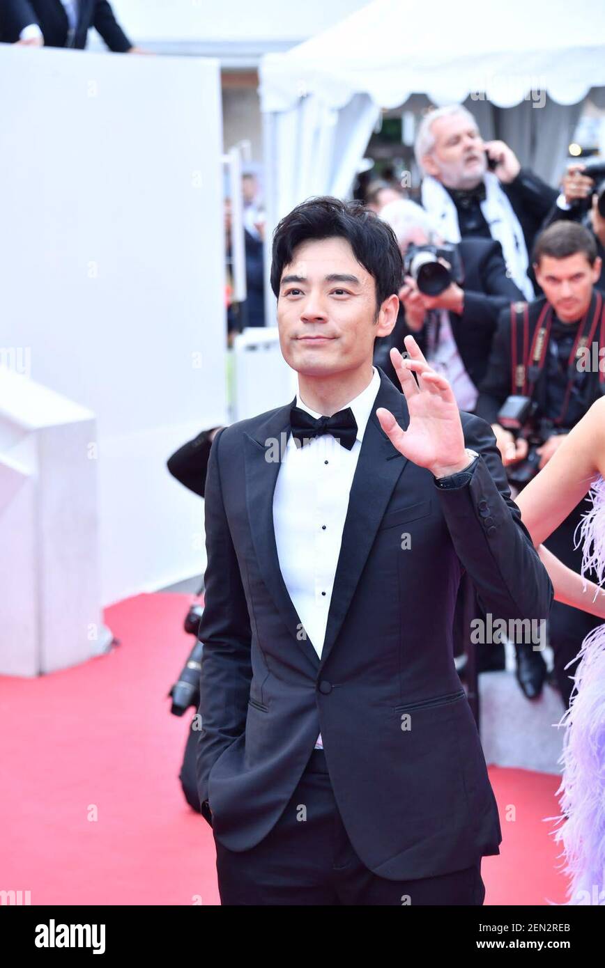 Chinese actor Li Guangjie poses on the red carpet for the closing ...
