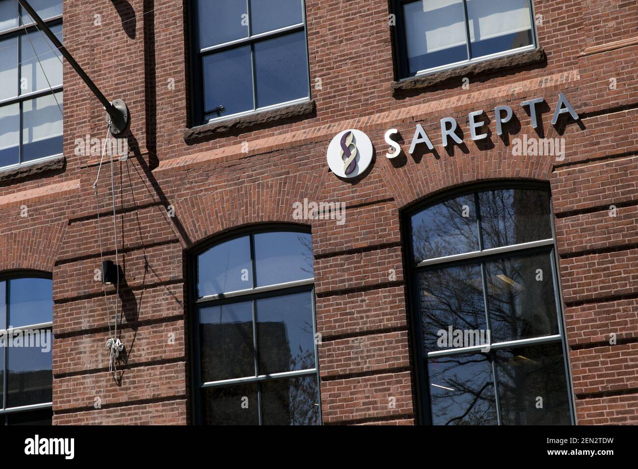 A logo sign outside of the headquarters of Sarepta Therapeutics in
