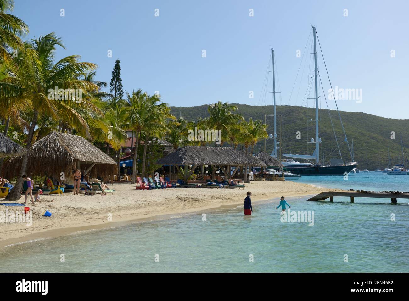 Palapas on the sandy beach at the Bitter End Yacht Club, Gorda Sound, Virgin Gorda, British Virgin Islands Stock Photo