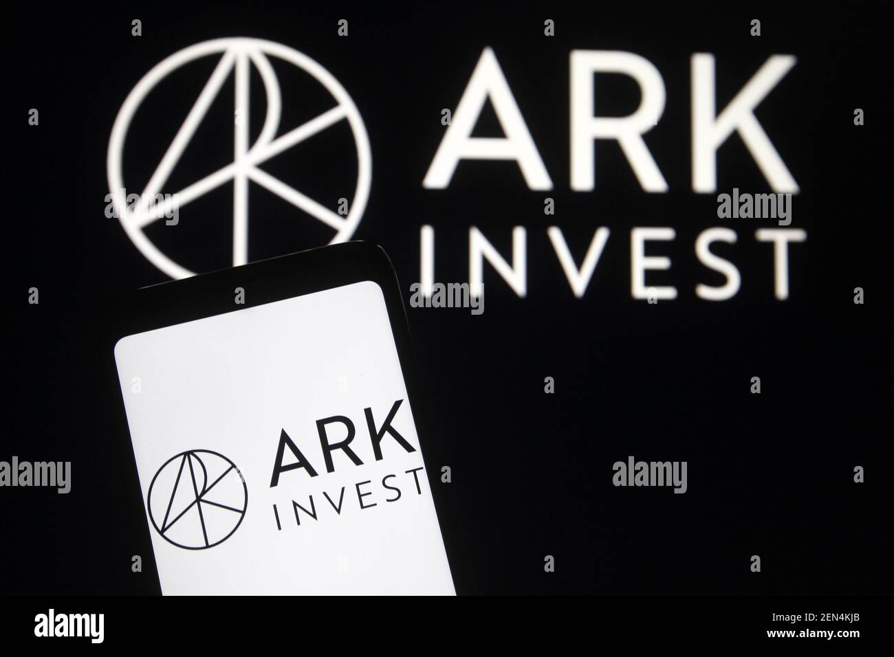Ukraine. 25th Feb, 2021. In this photo illustration an ARK Investment logo is seen on a smartphone and a pc screen Credit: Pavlo Gonchar/SOPA Images/ZUMA Wire/Alamy Live News Stock Photo