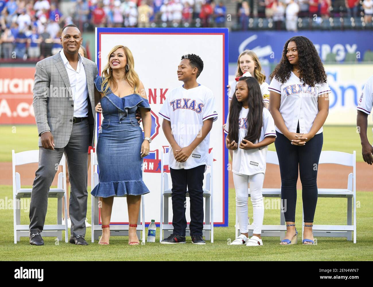 June 08, 2019: Former Texas Rangers third baseman Adrian Beltre #29 stands  on the field with his family including his wife Sandra, Adrian Jr, youngest  daughter Camilla, and oldest daughter Cassandra on