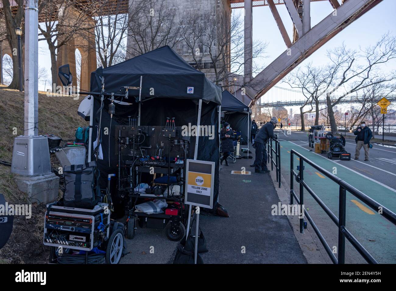 NEW YORK, NY – FEBRUARY 25: Crew and sound equipment seen during the filming of the television show 'Blue Bloods' season eleven in Astoria Park on February 25, 2021 in New York City. Credit: Ron Adar/Alamy Live News Stock Photo
