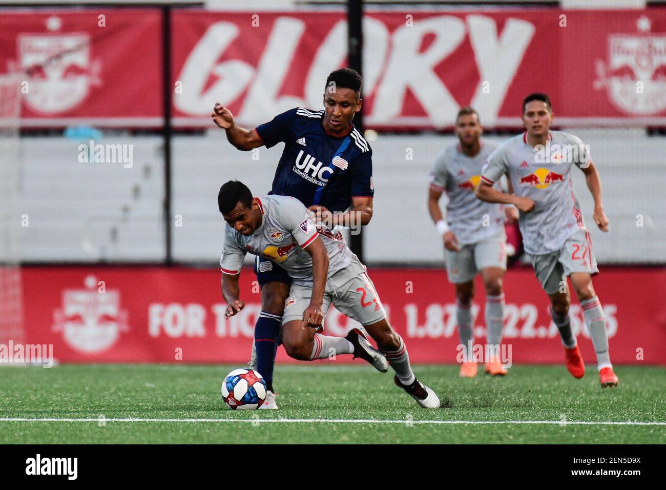 Jun 11 19 Montclair Nj Usa New York Red Bulls Midfielder Christian Casseres Jr 23 Tackles New England Revolution Forward Juan Agudelo 17 During The First Half At Msu Soccer Park At Jun 11 19 Montclair Nj Usa New York Red Bulls Midfielder Christian Casseres Jr 23 Tackles New England Revolution Forward Juan Agudelo 17 During The First Half At Msu Soccer Park At