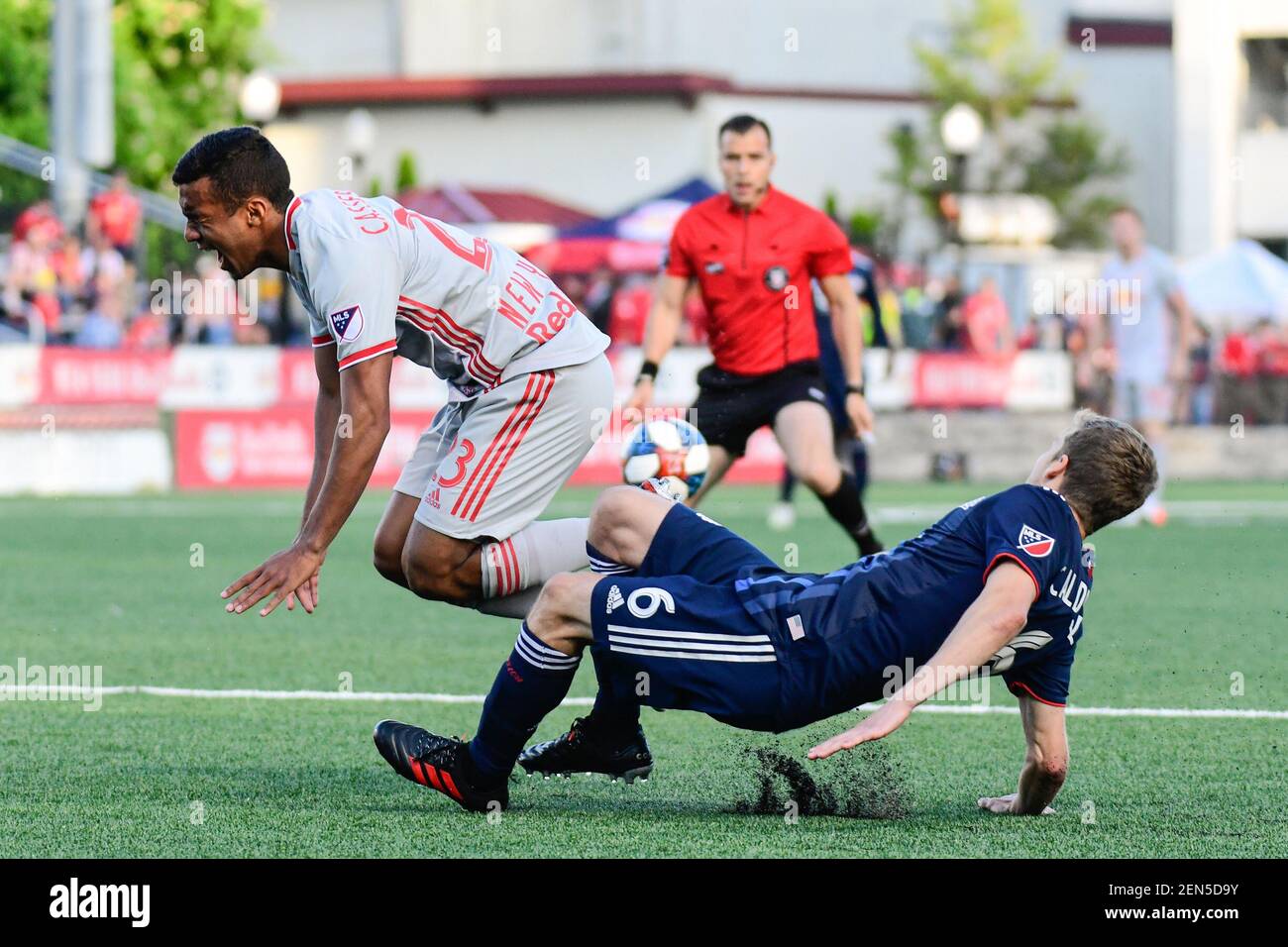 Jun 11 19 Montclair Nj Usa New York Red Bulls Midfielder Christian Casseres Jr 23 Is Tackled By New England Revolution Midfielder Scott Caldwell 6 During The First Half At Msu Soccer