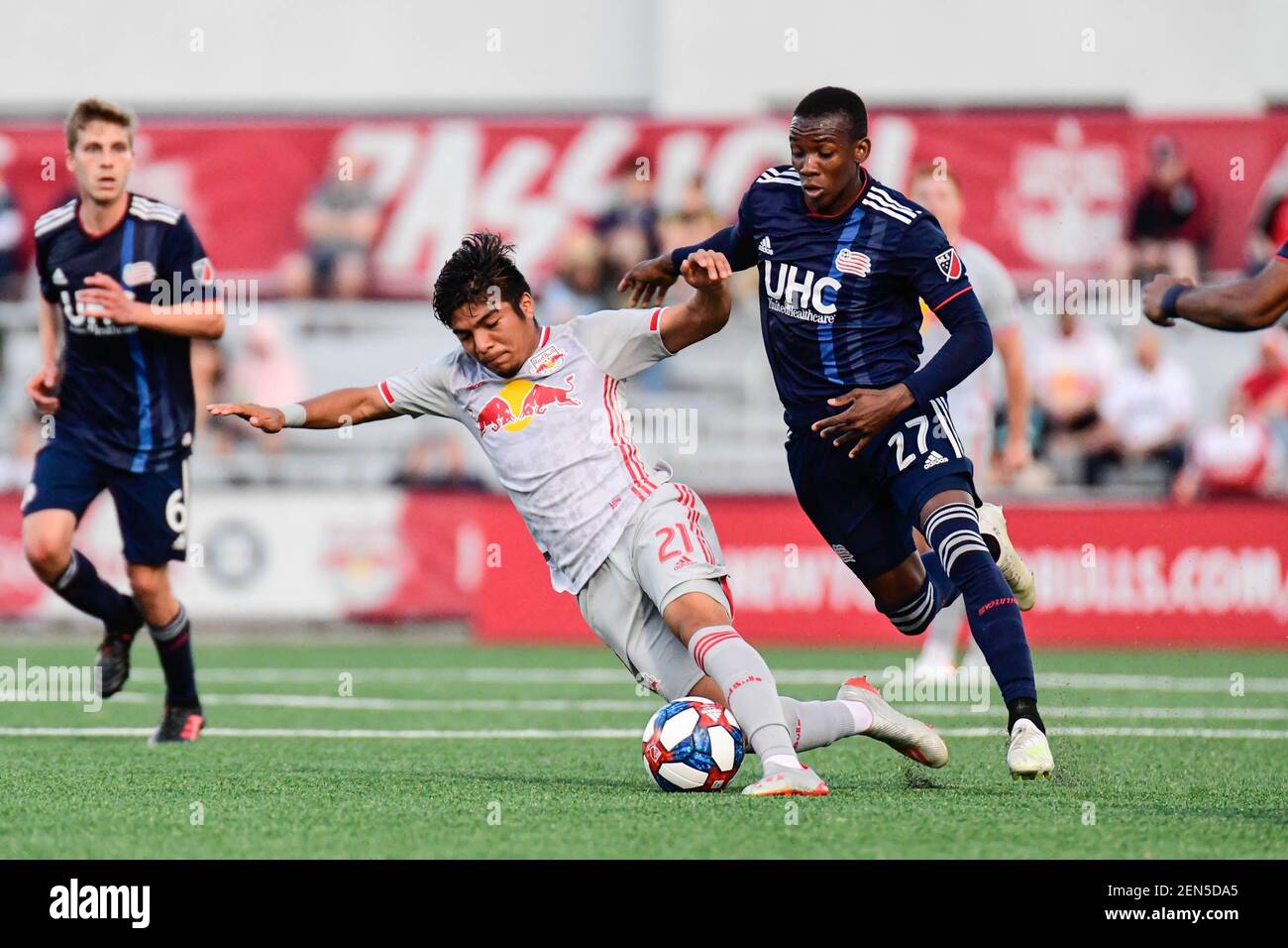 Jun 11 19 Montclair Nj Usa New York Red Bulls Midfielder Omar Fernandez 21 Passes The Ball Against New England Revolution Midfielder Luis Caicedo 27 During The First Half At Msu Soccer Jun 11 19 Montclair Nj Usa New York Red Bulls Midfielder Omar Fernandez 21 Passes The Ball Against New England Revolution Midfielder Luis Caicedo 27 During The First Half At Msu Soccer