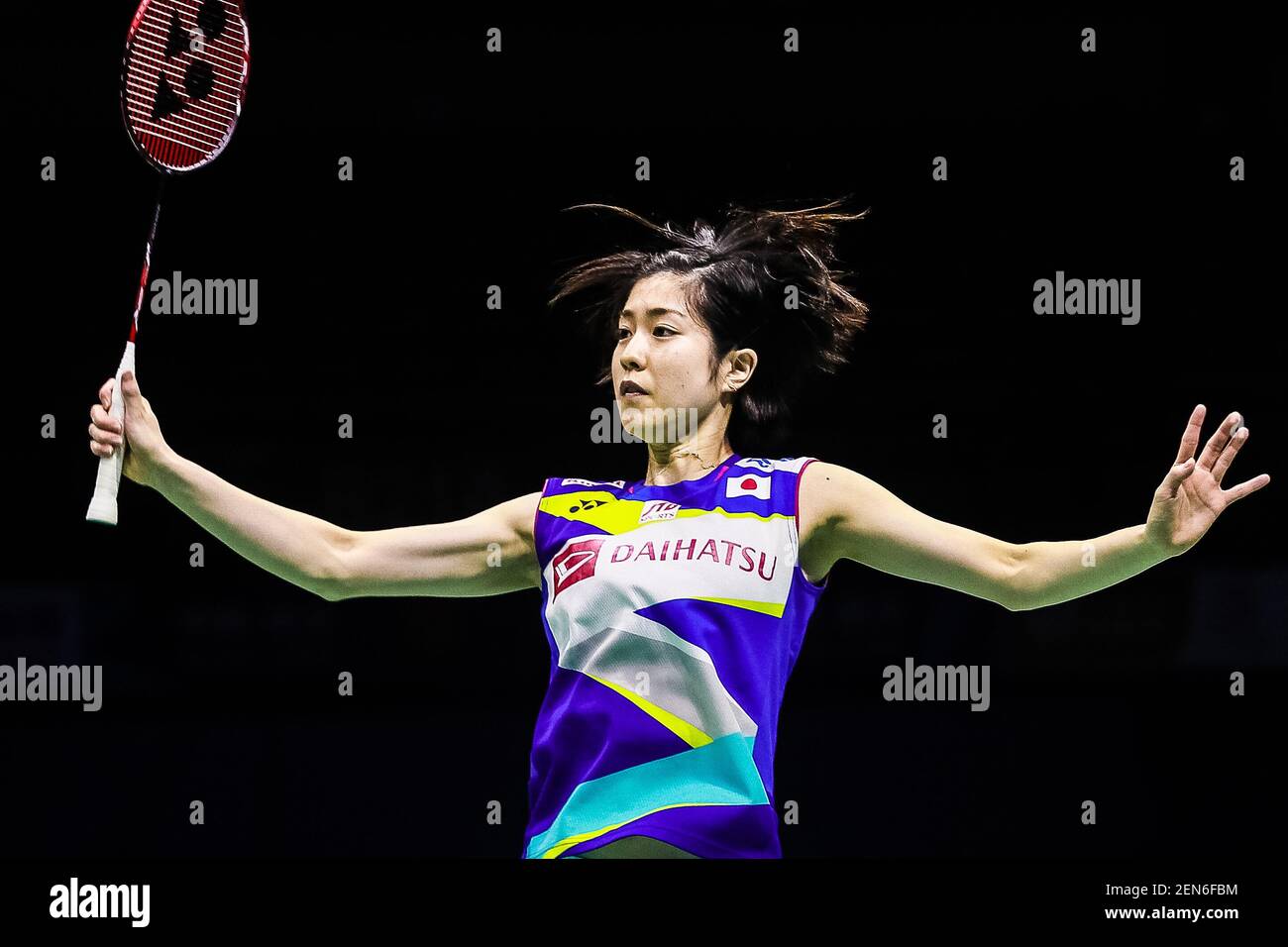 Ayane Kurihara returns a shot to Sachin Dias and Thilini Pramodika  Hendahewa of Sri Lankan in their first round match of Mixed Doubles during  the 2019 Badminton Asia Championships in Wuhan city,