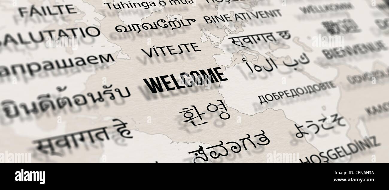 Welcome in different language on paper with world map background. Depth of field image. Words cloud concept. Stock Photo