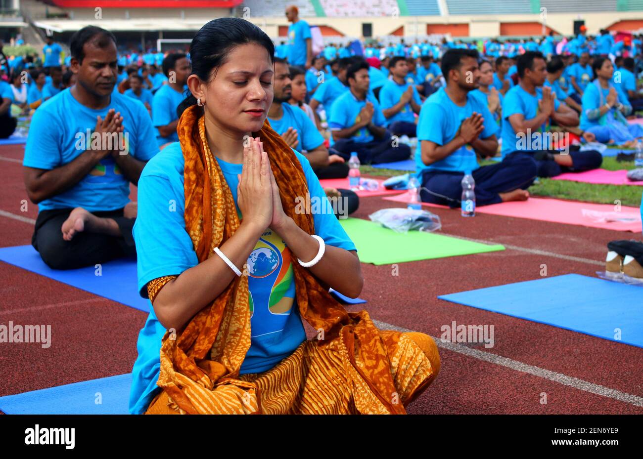 A woman seen practicing Yoga during International Yoga Day in Dhaka