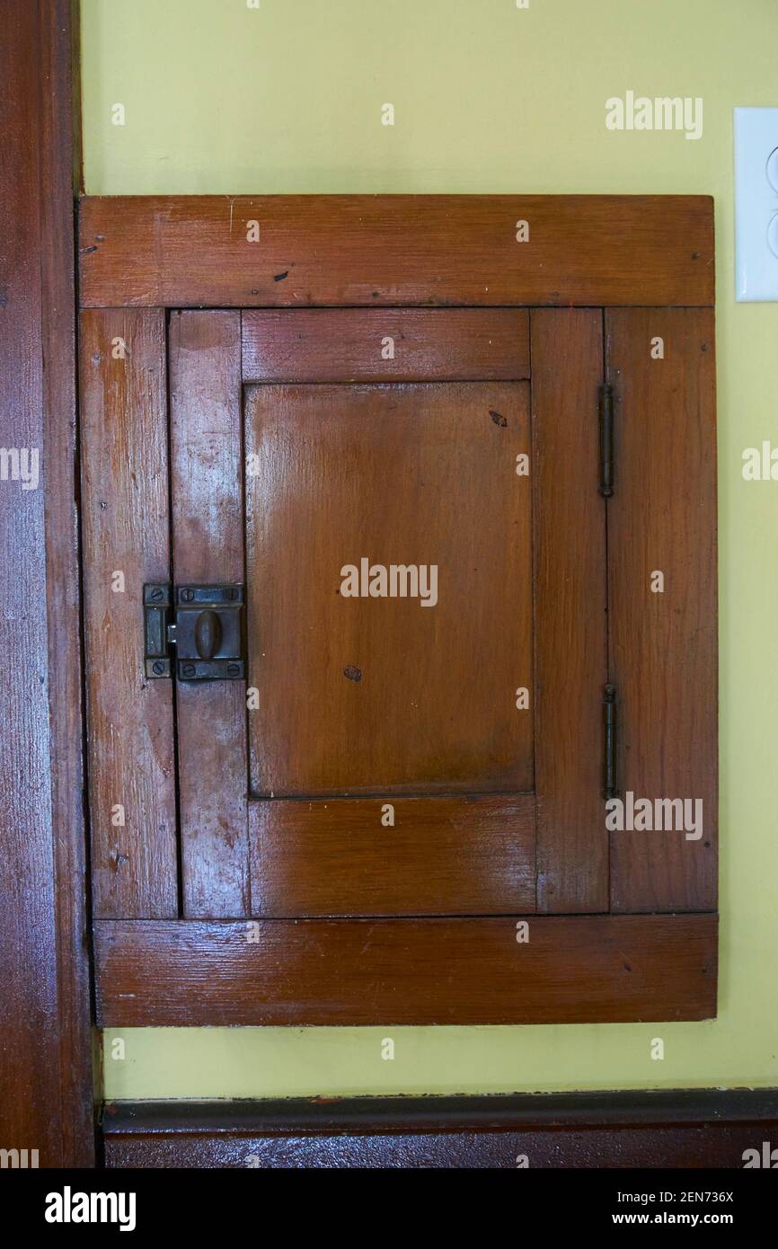 Antique clothes chute door in home. Stock Photo