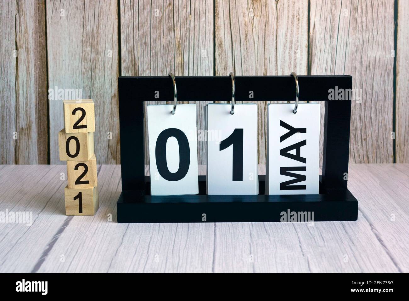 Text on wooden block cube and paper stand frame. Labor day concept Stock Photo
